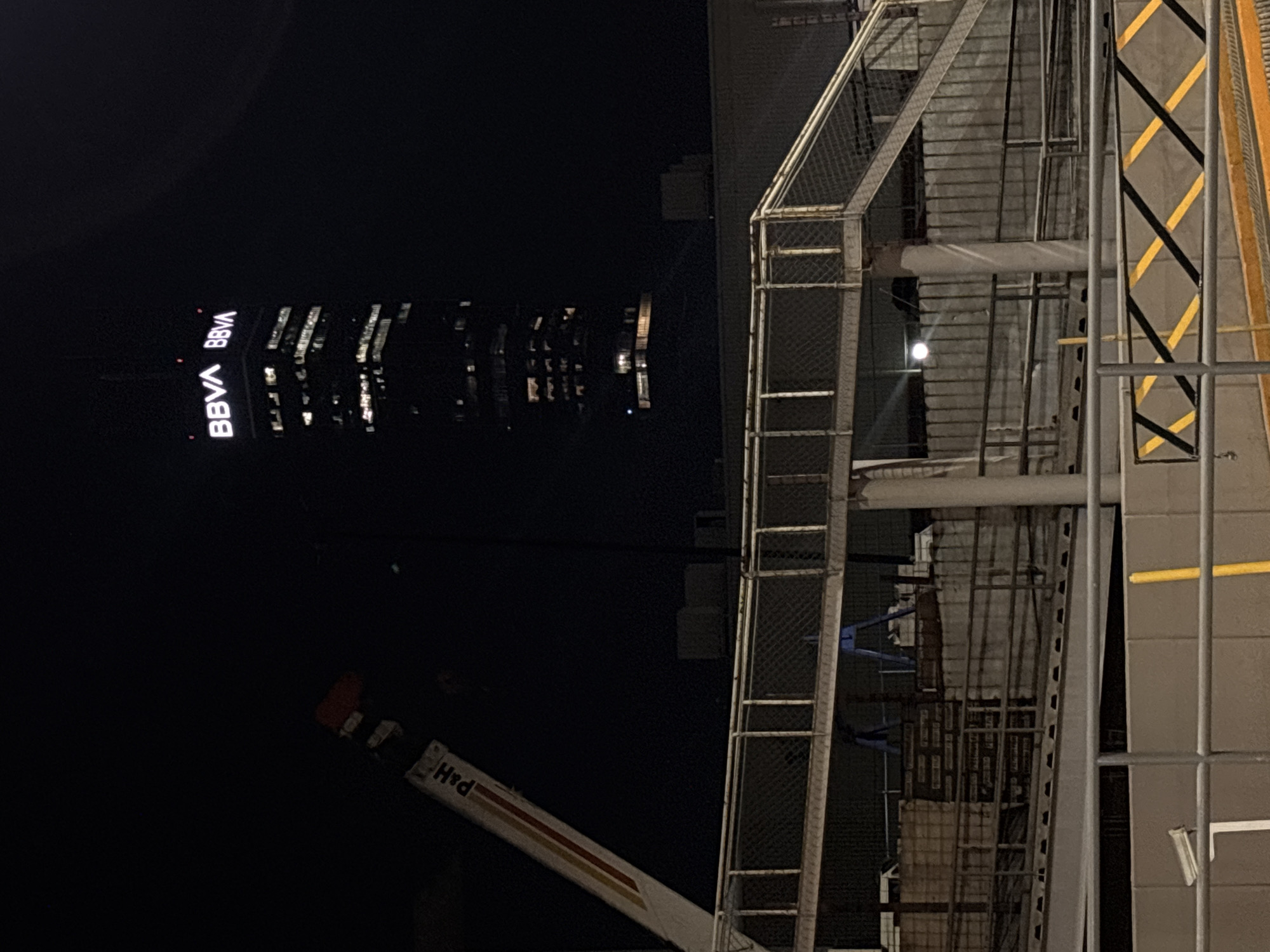BBVA building illuminated during nighttime construction in Mexico