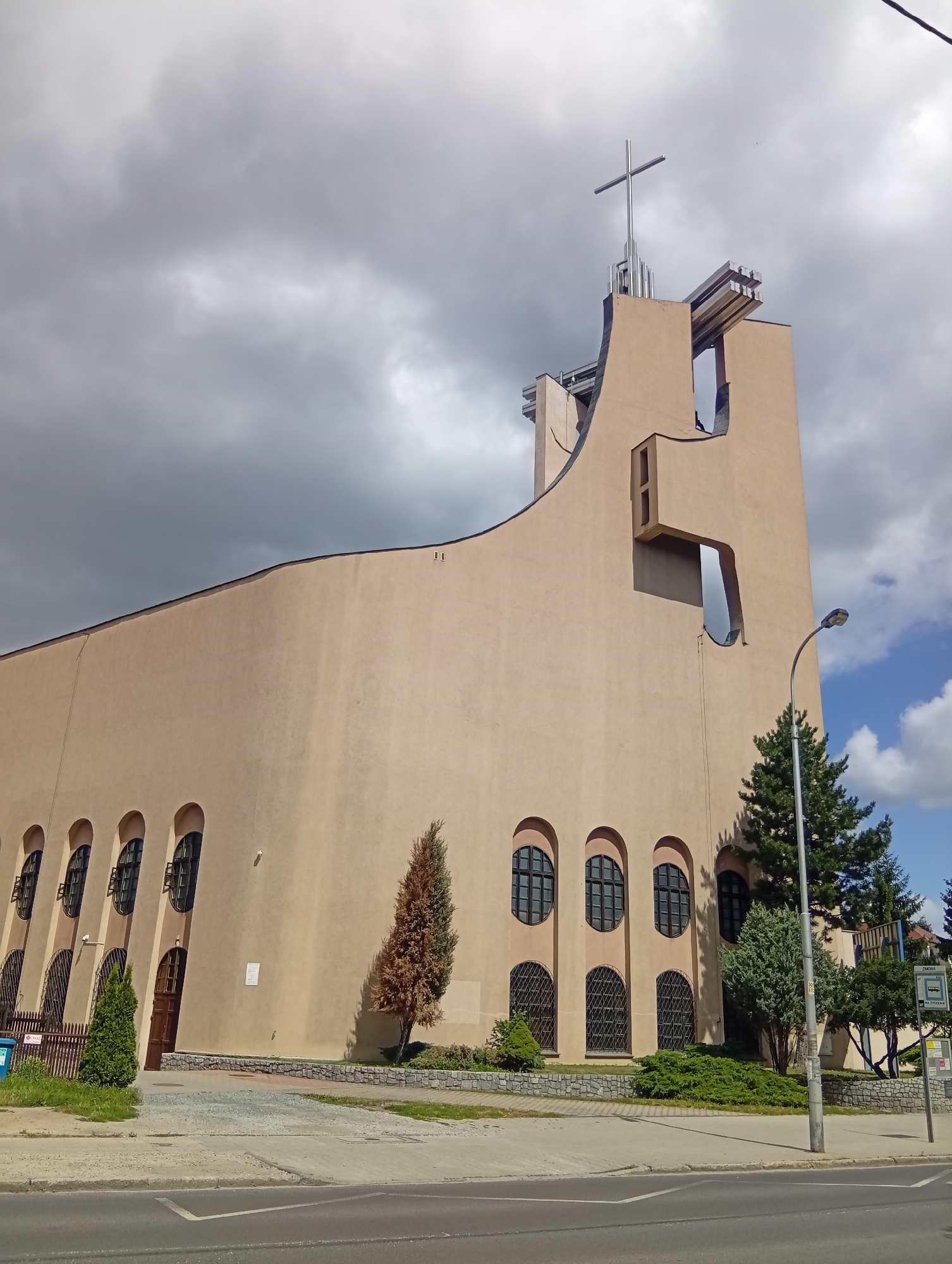 Church, sky, and a roaring T-Rex: a Wrocław morning