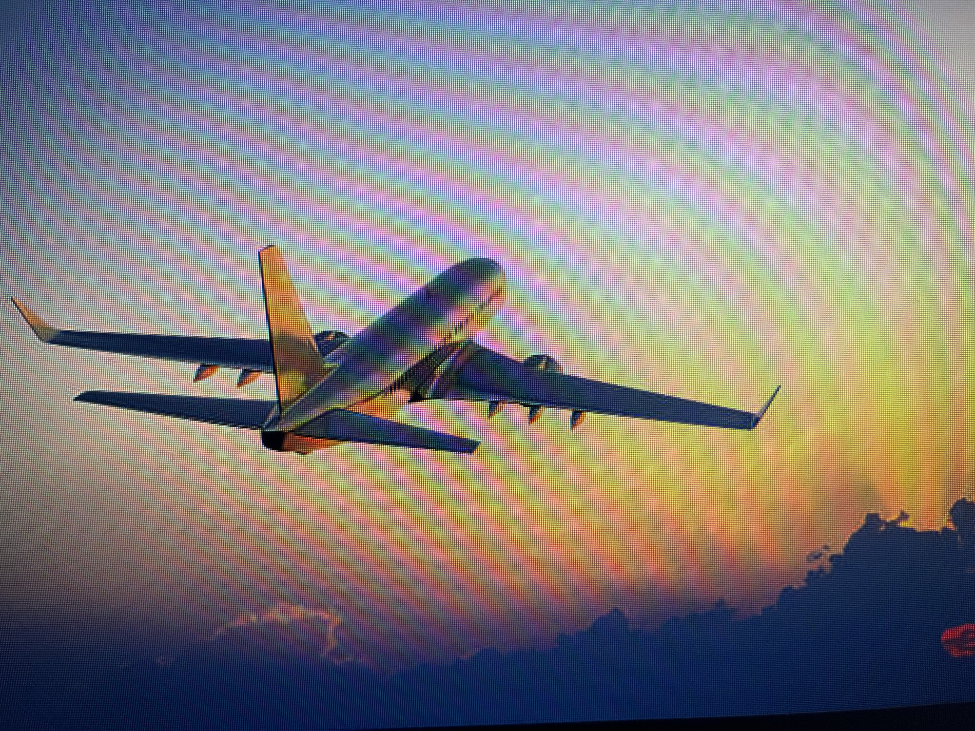 Commercial aircraft spotted over clouds at sunrise near Varna