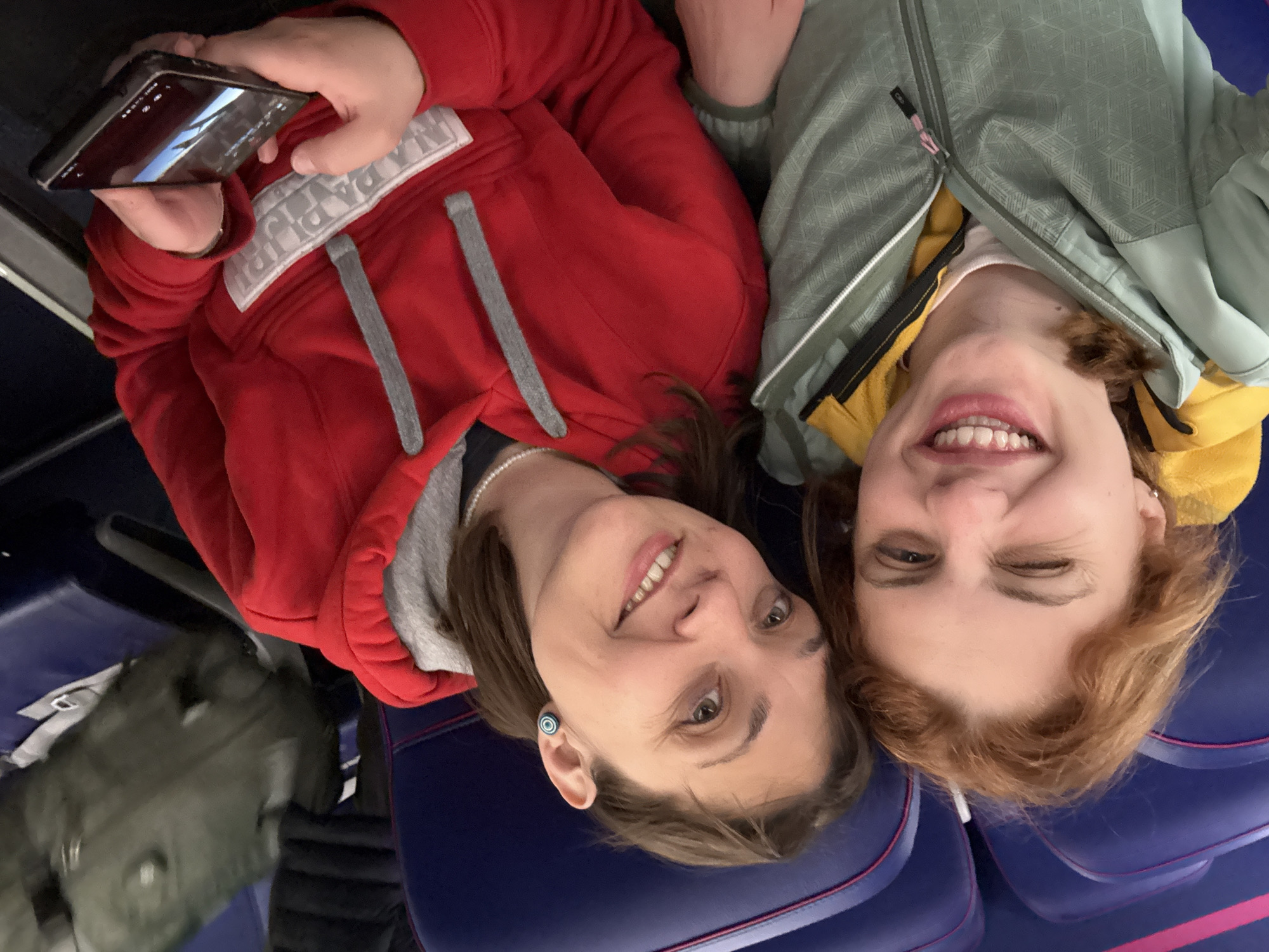 Two women photographed indoors in Fiumicino, Italy