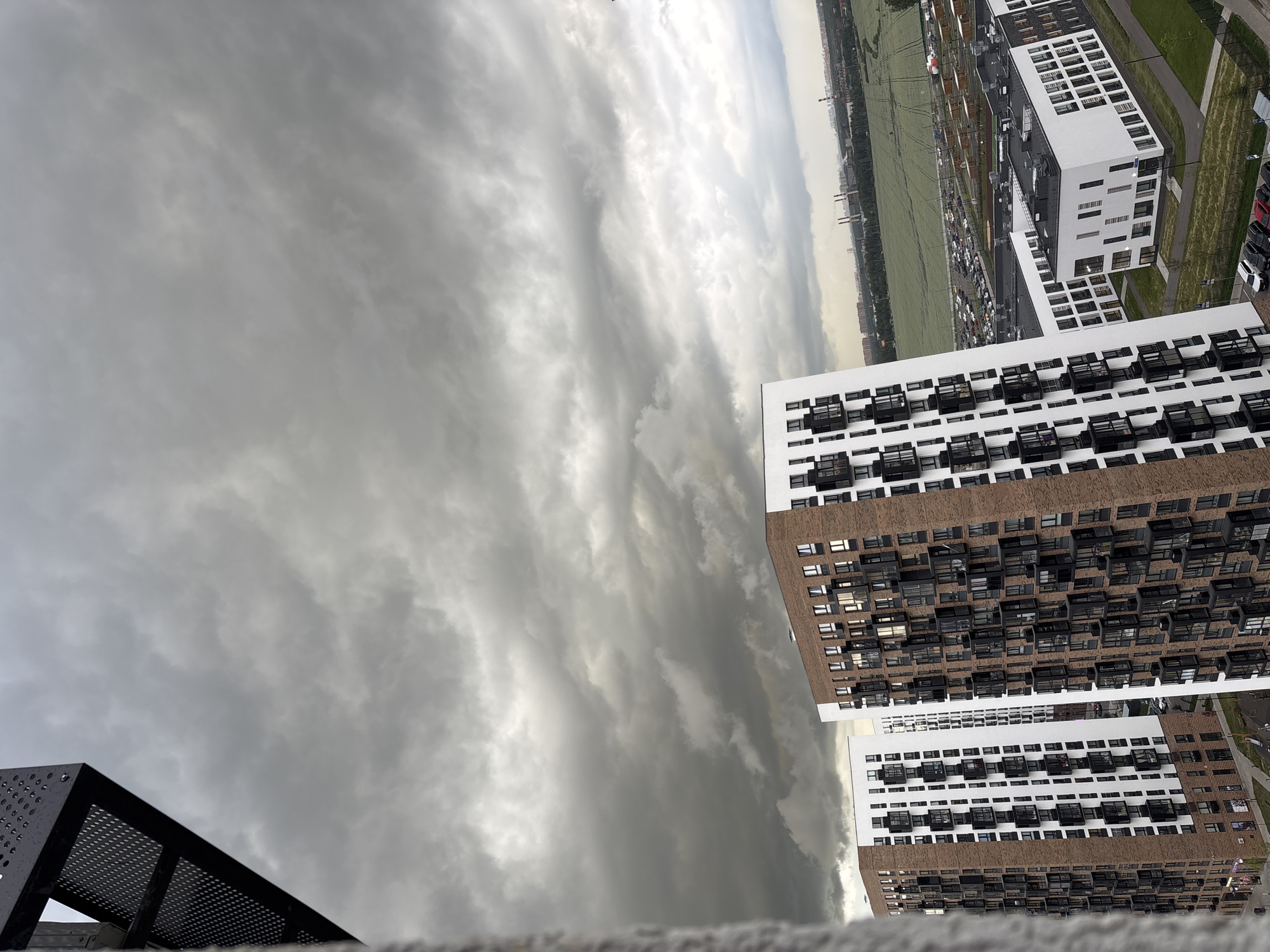 Storm clouds gather over Misaylovo apartment blocks