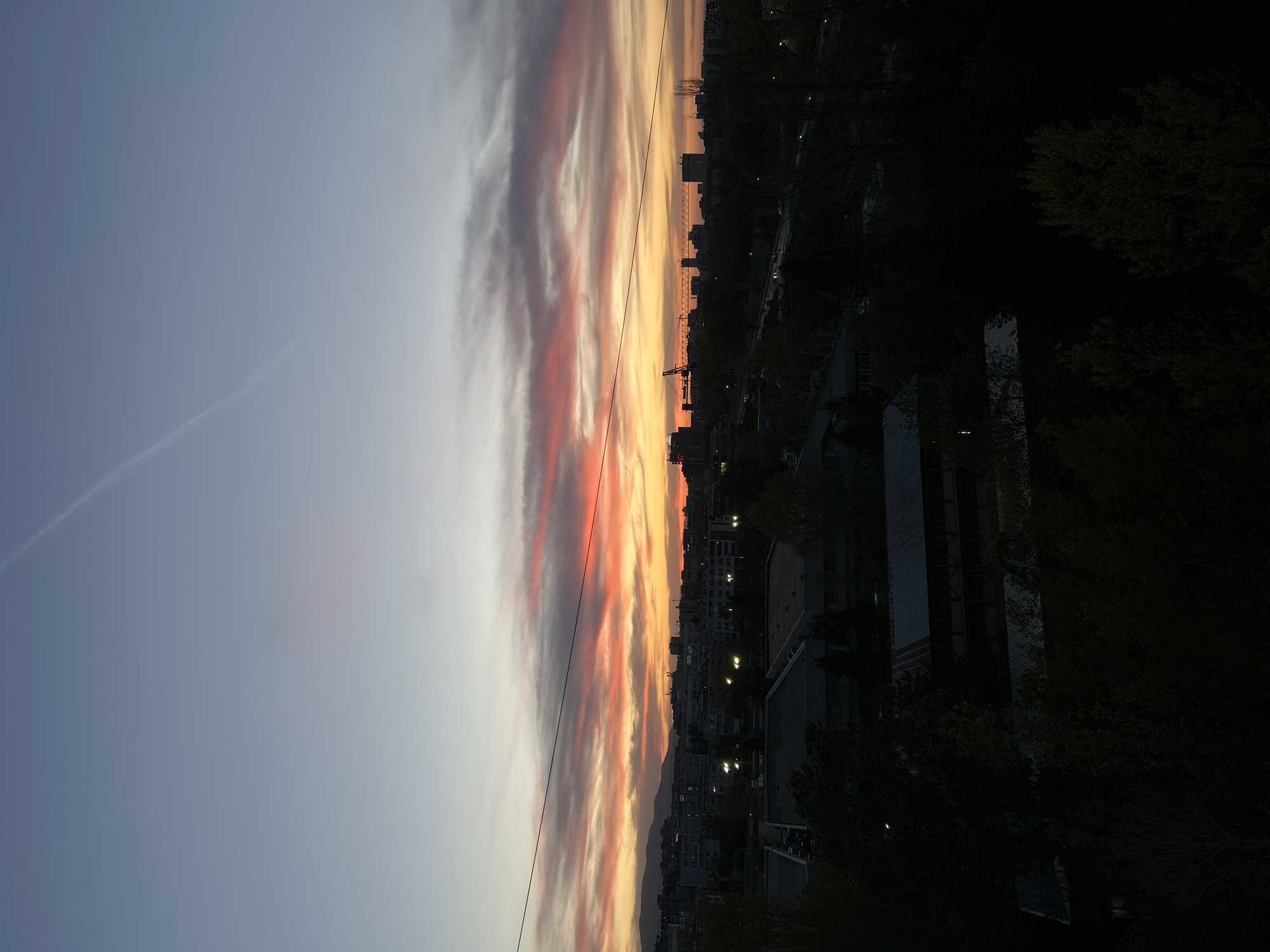 Dramatic sunset displays vivid colors over Sofia skyline