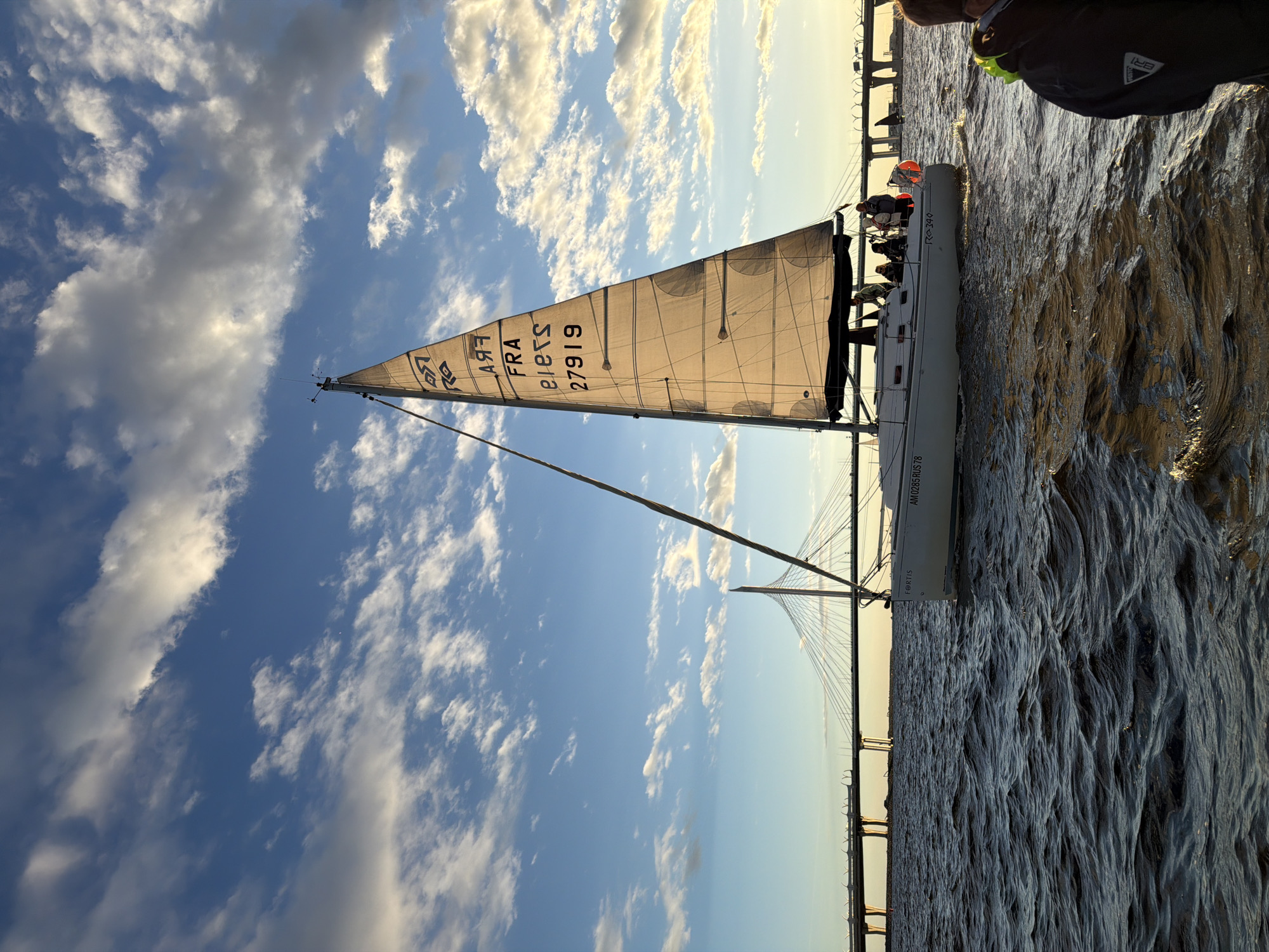 Sailing regatta on Saint Petersburg's waterways at golden hour
