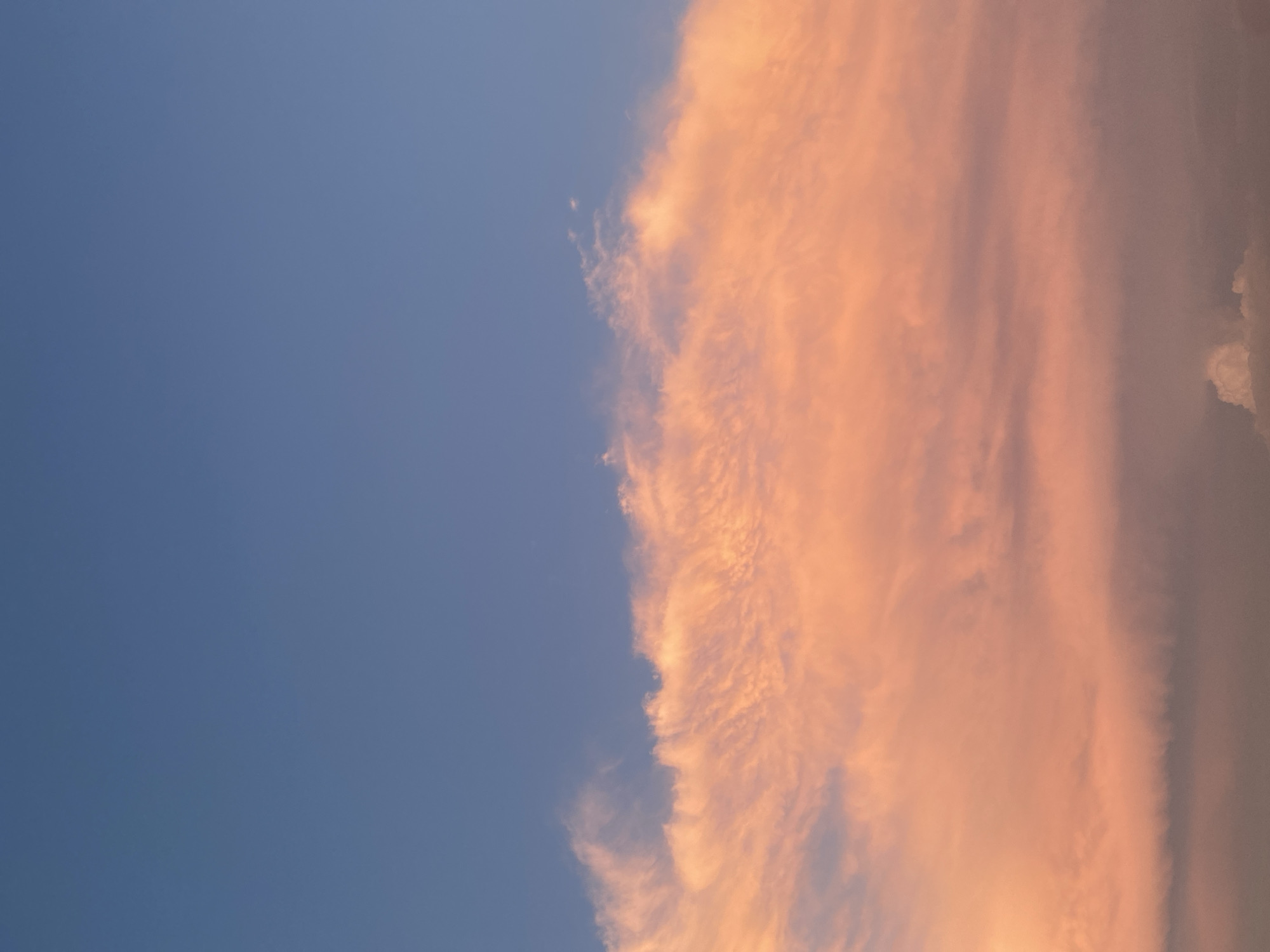 Sunset cityscape with dramatic pink clouds from multiple angles