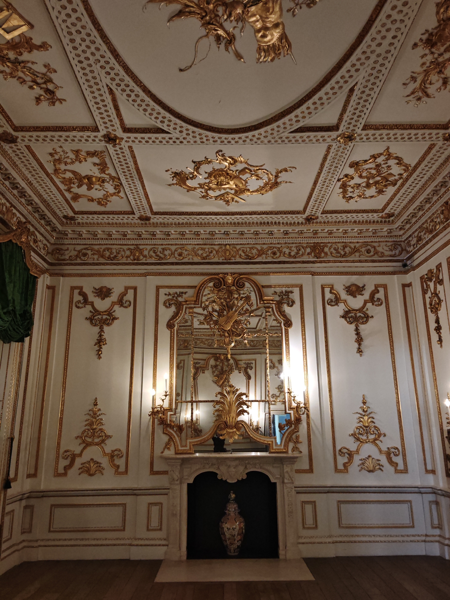 Ornate gold-detailed interior room documented in London