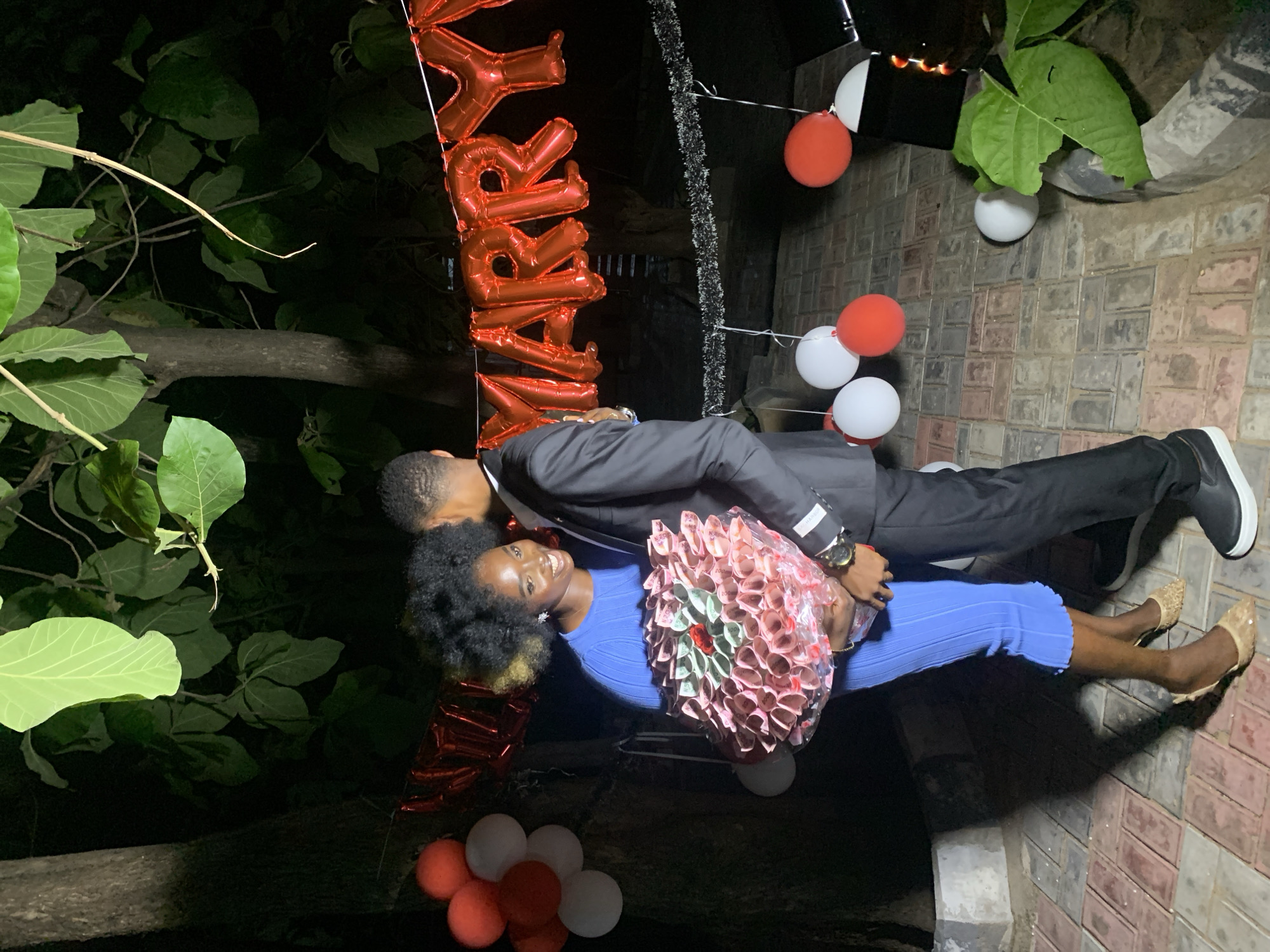 Marriage proposal celebration captured alongside daily life in Adankolo, Nigeria