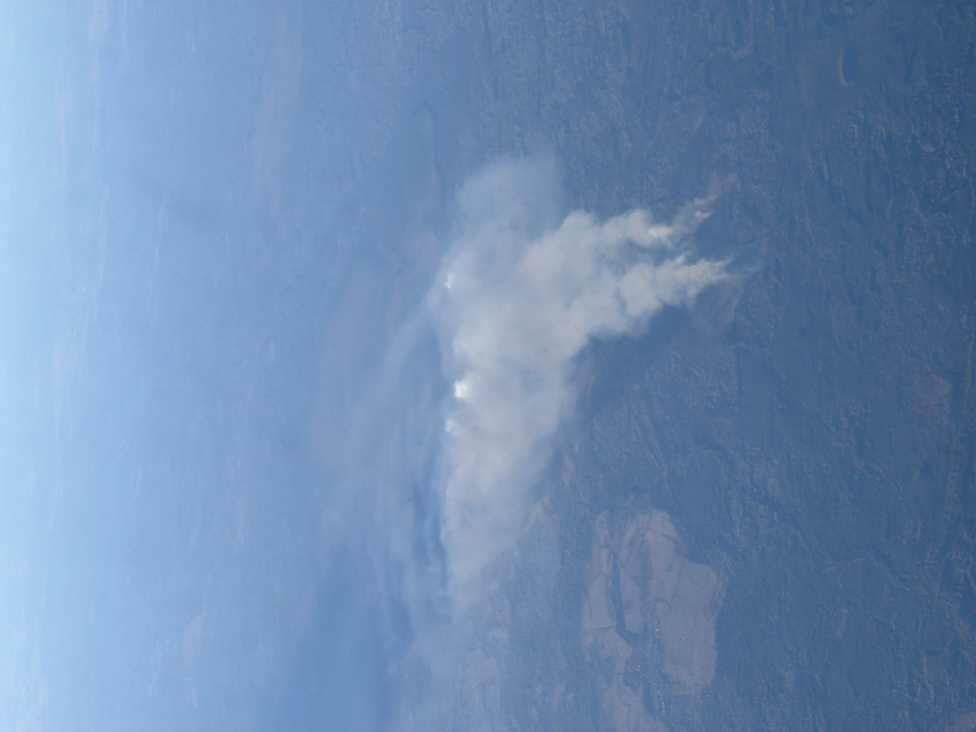 White smoke plume spotted over rural Saint Petersburg landscape