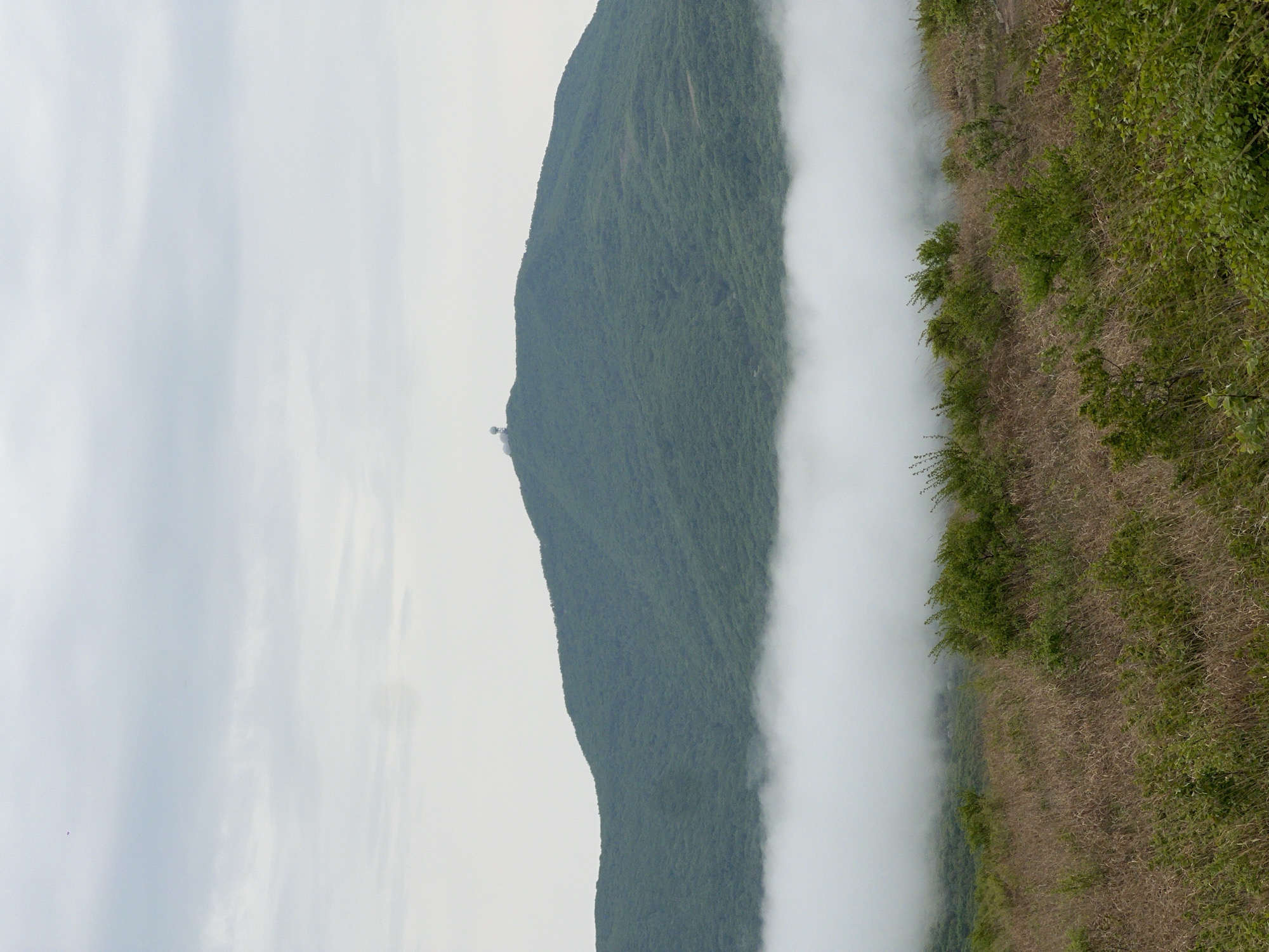 Foggy mountain landscape observed in Vityaz', Russia