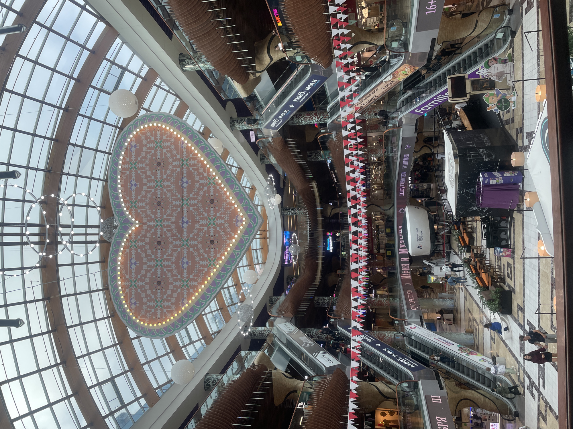 Wandering a Saint Petersburg mall with FLY ARENA ads throughout