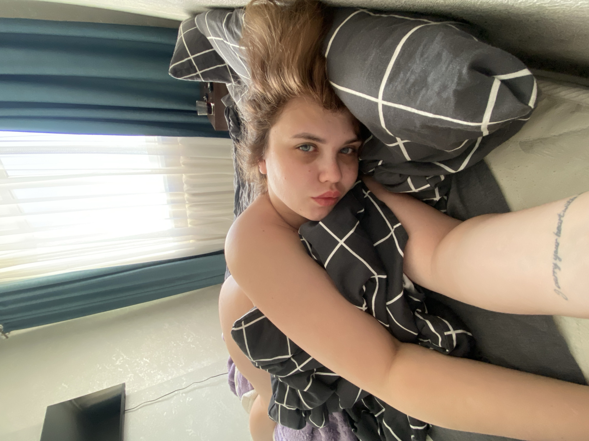 Woman takes bedtime selfie in Chernushka, Russia