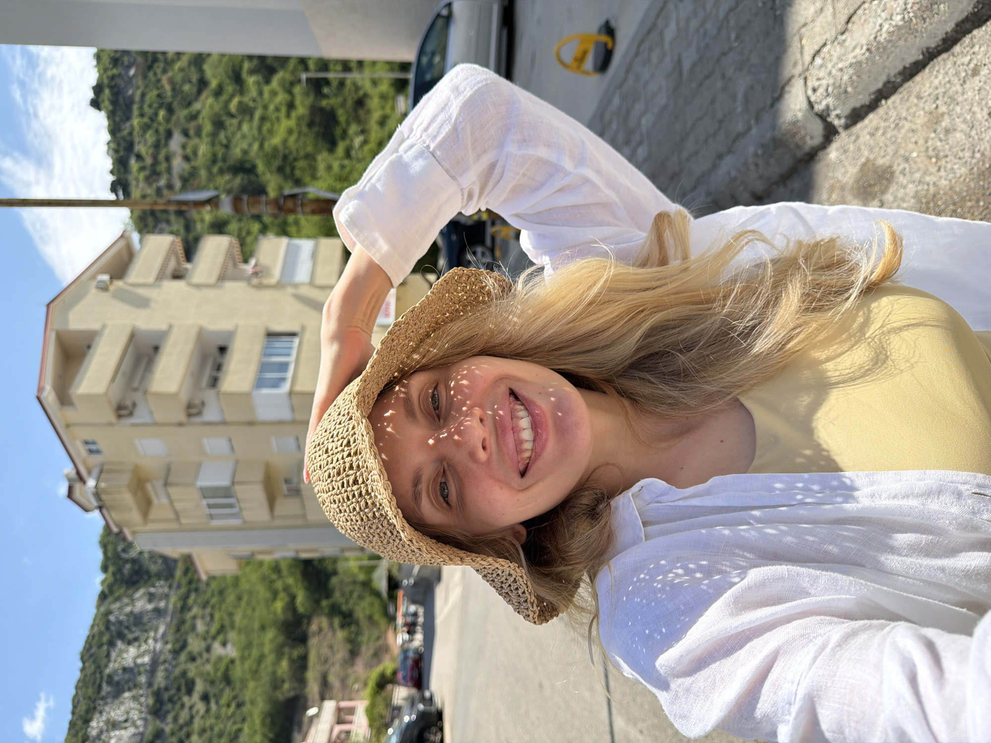 Tourist takes selfies on sunny morning in Budva Montenegro