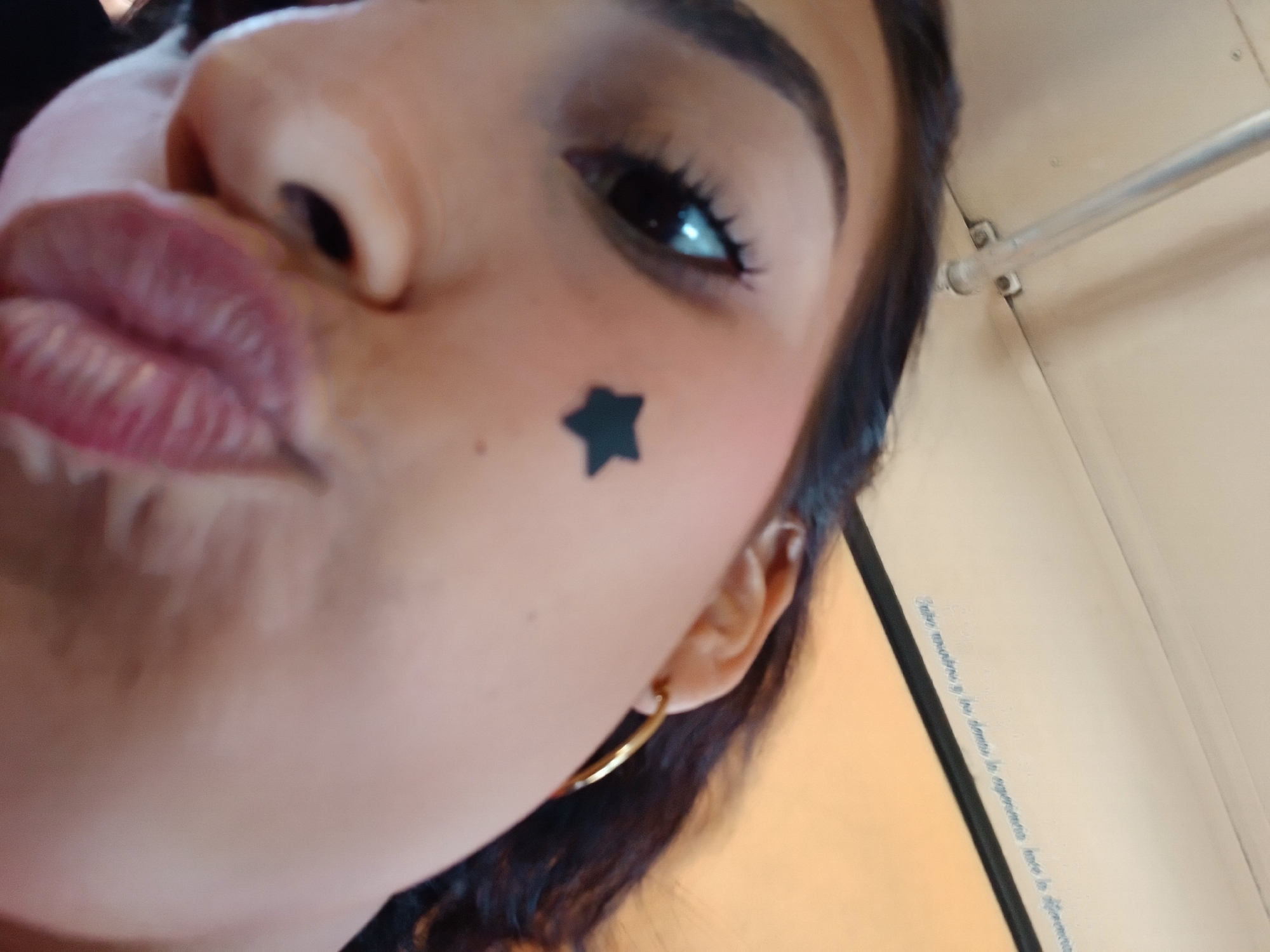 Person takes decorated selfies with star stickers in Venezuela
