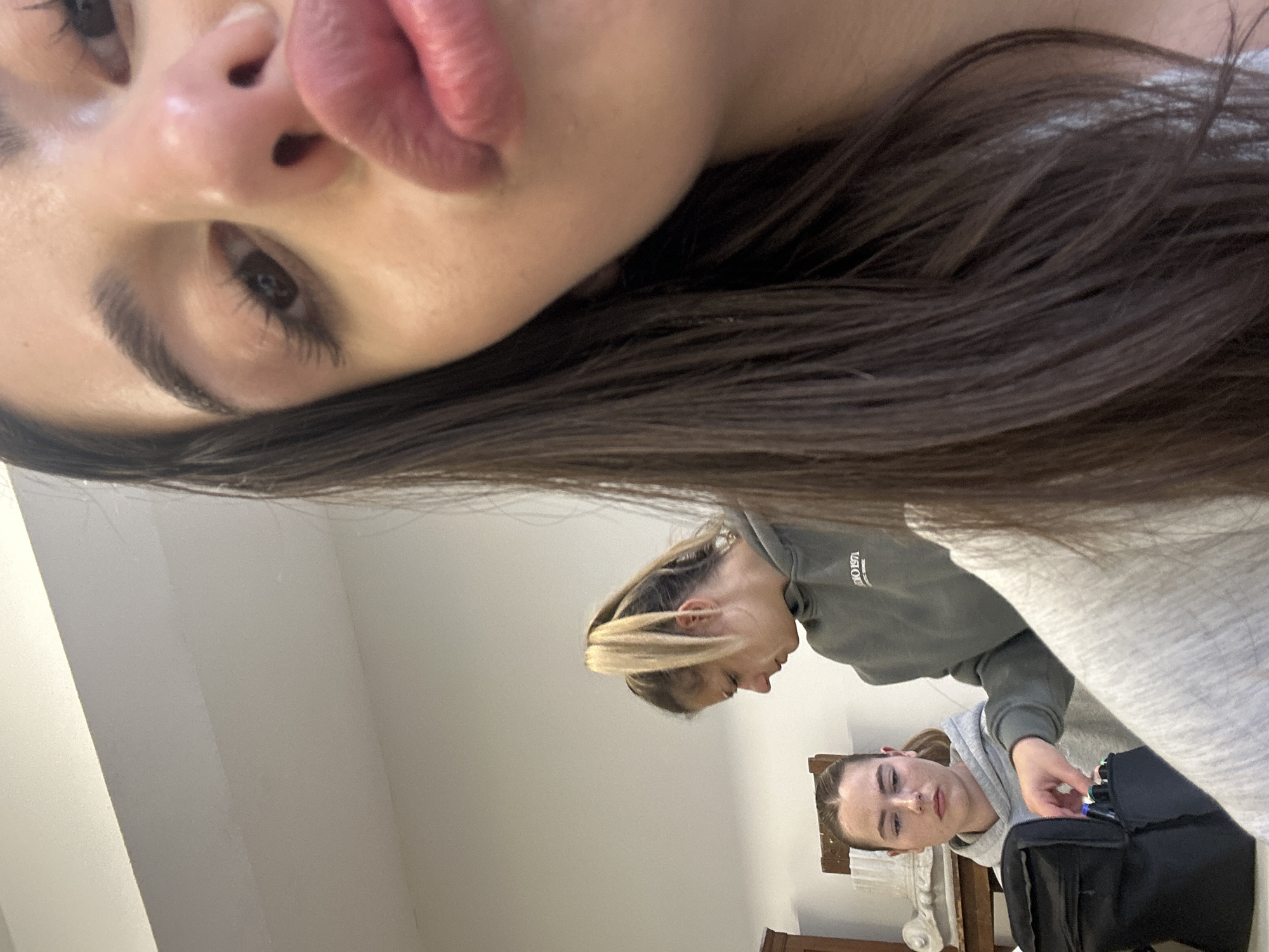 Person takes selfies, works on art project in Sofia studio