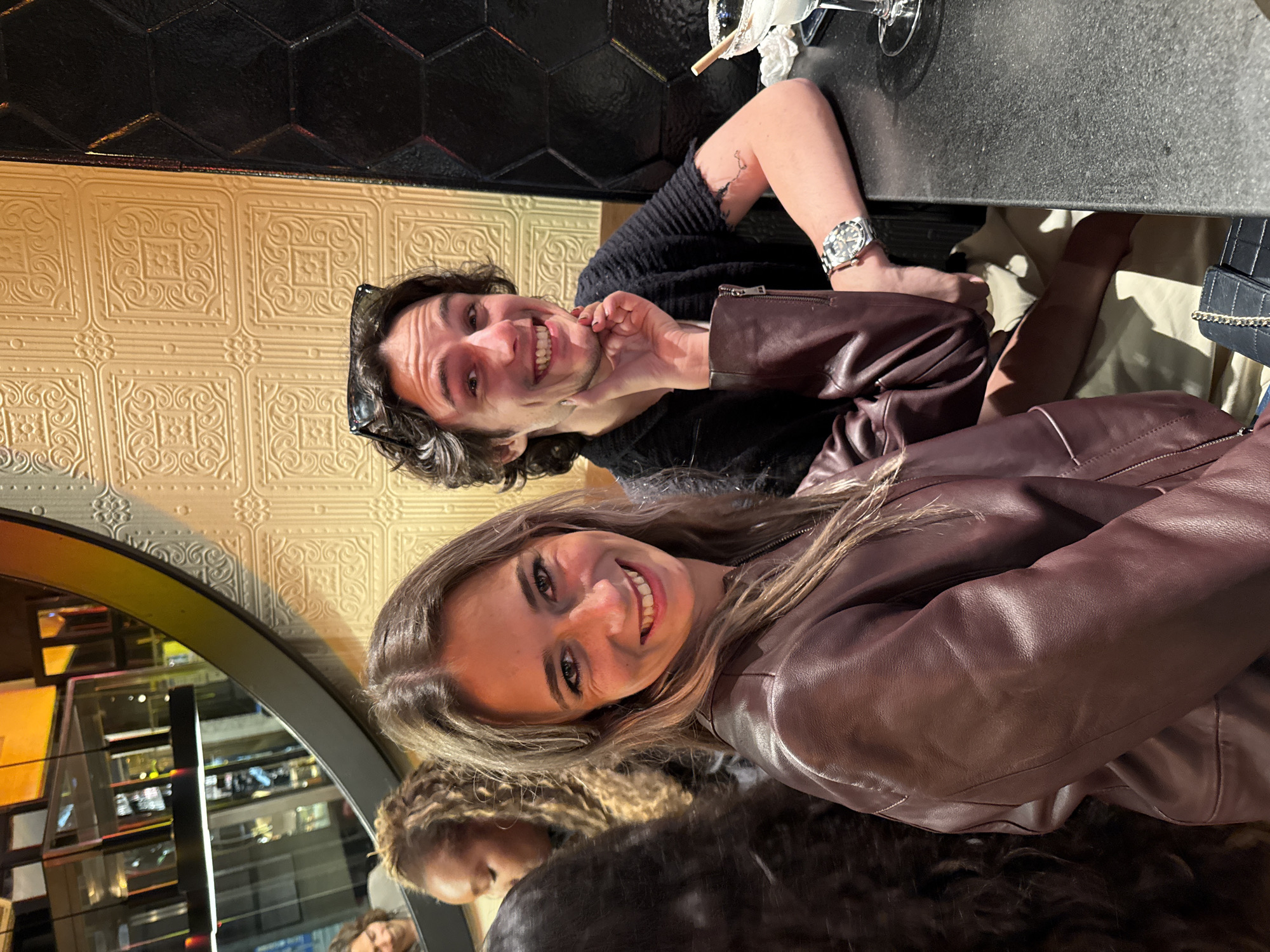 Friends gather for evening socializing in Madrid establishment