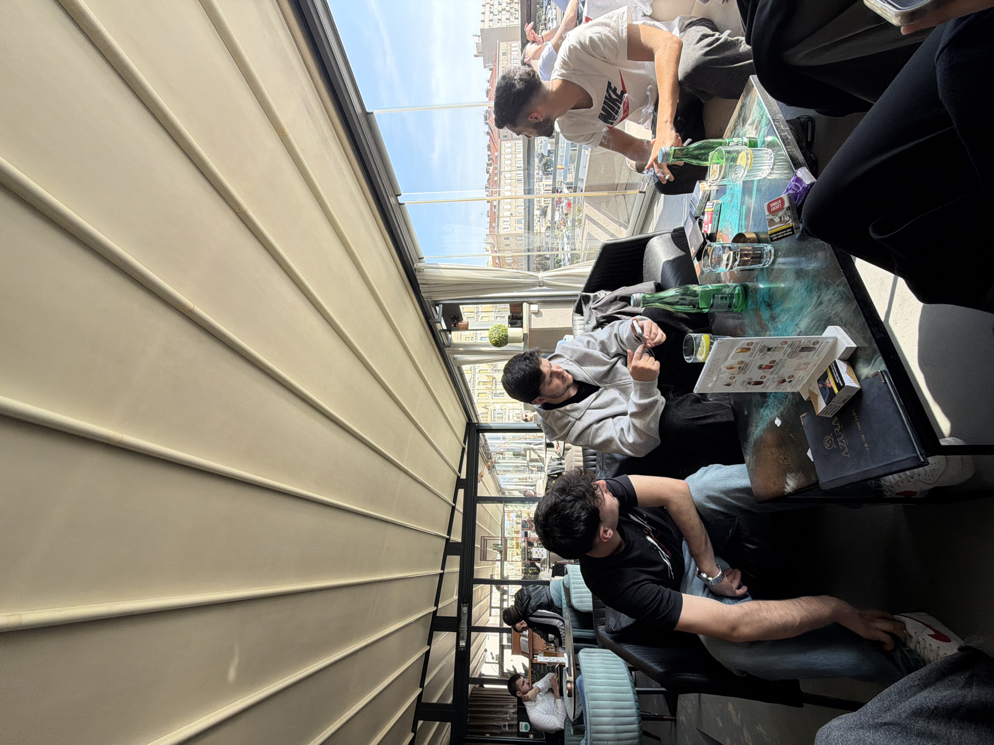 Young men gather for lunch at Rijeka rooftop restaurant