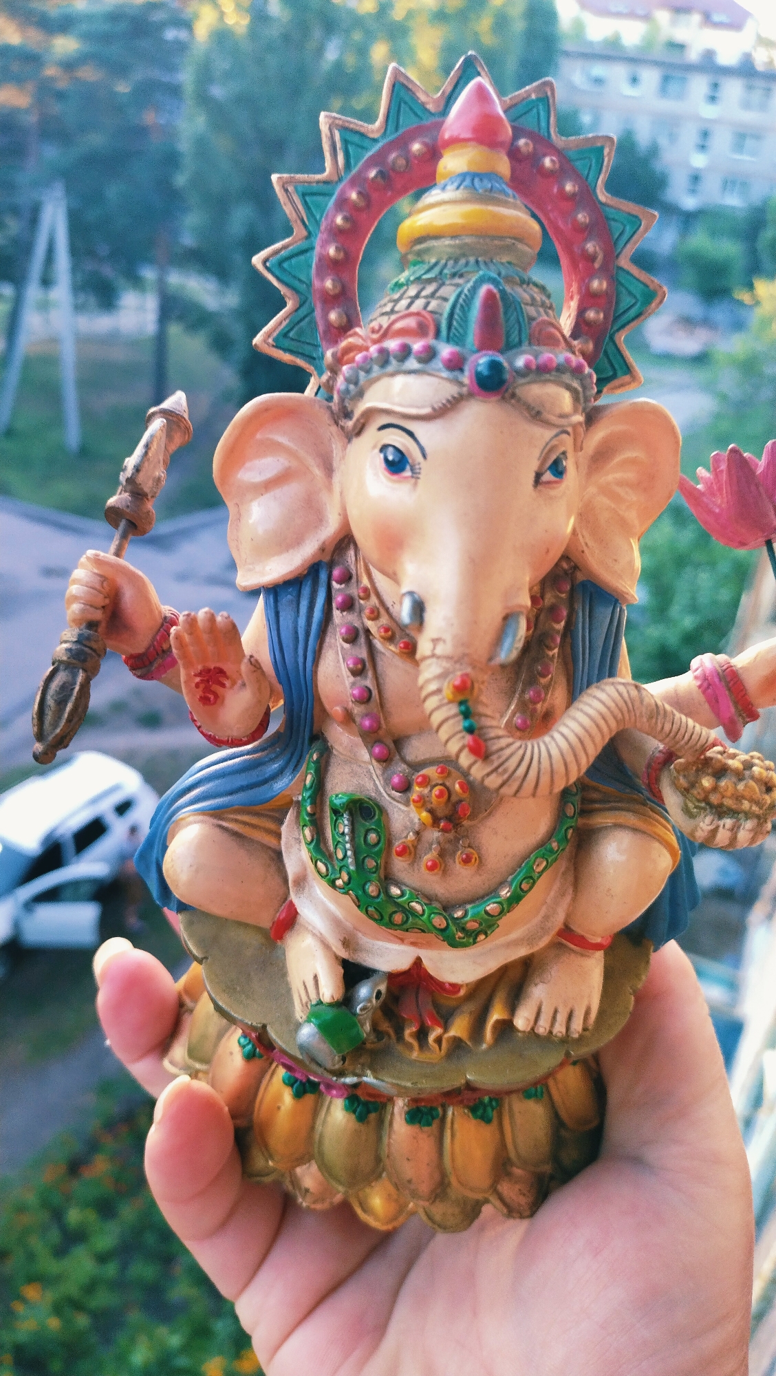 Ganesha figures, cash, a shofar, and a relaxed Rottweiler in Ukraine