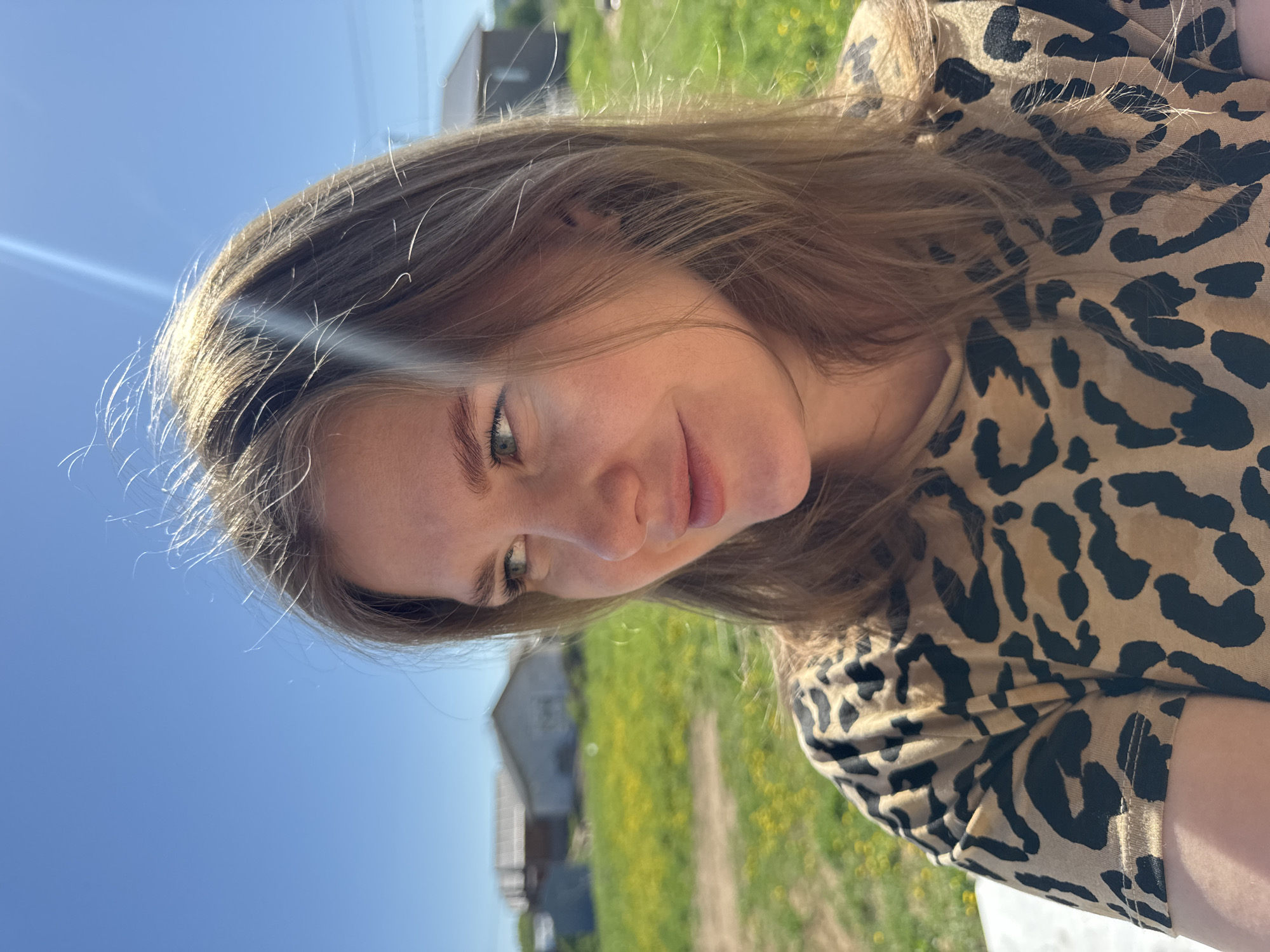 Woman photographed in leopard print top in Ферма, Russia