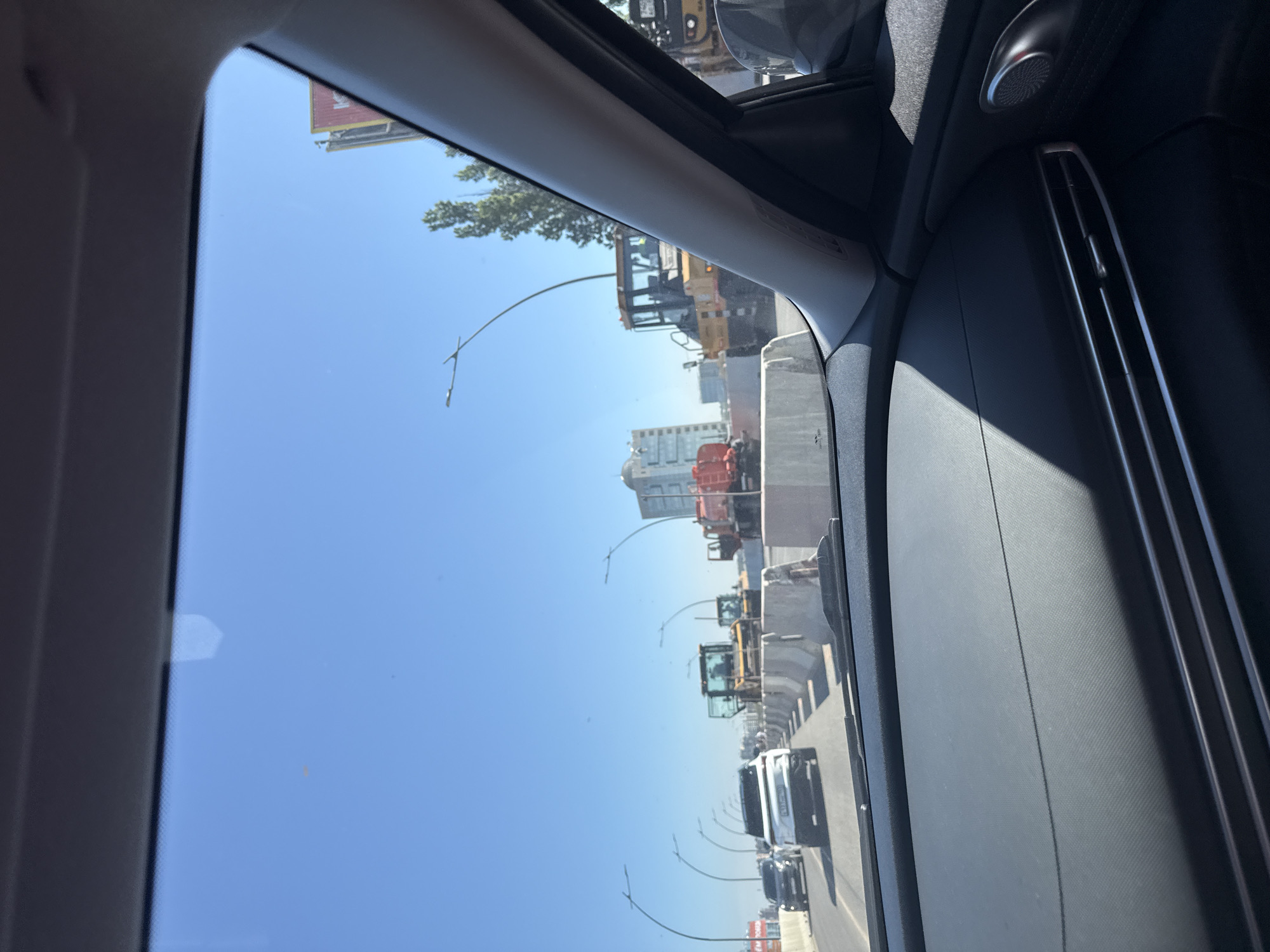 Morning drive through city streets captured from vehicle interior