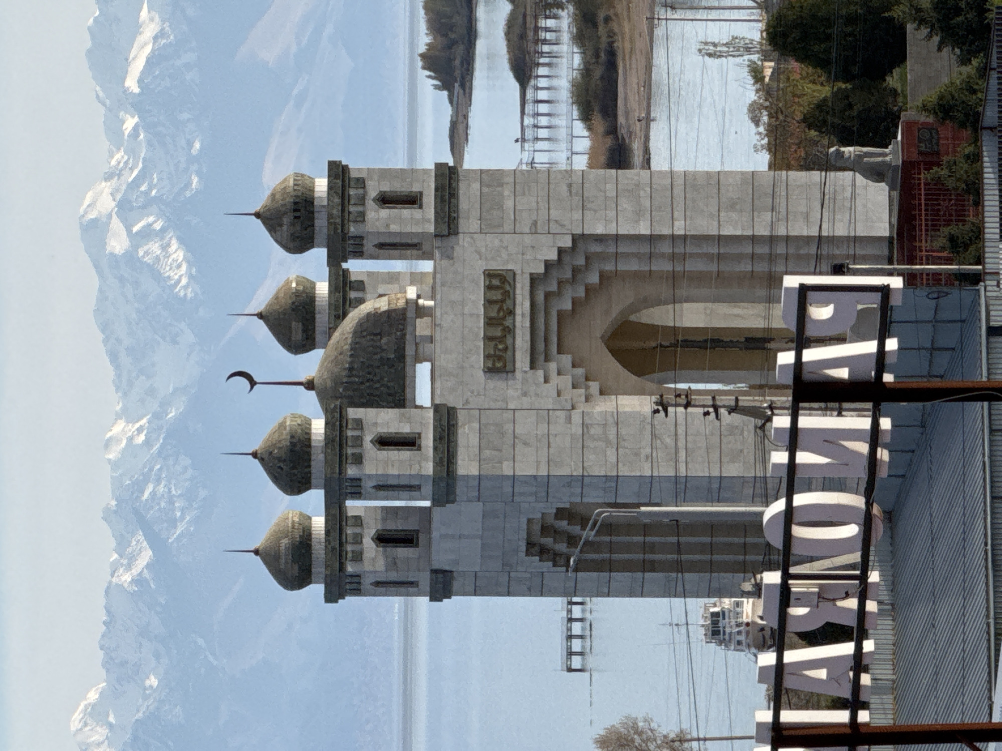 Tourist captures scenic views of Çolpon-Ata cultural sites, mountains