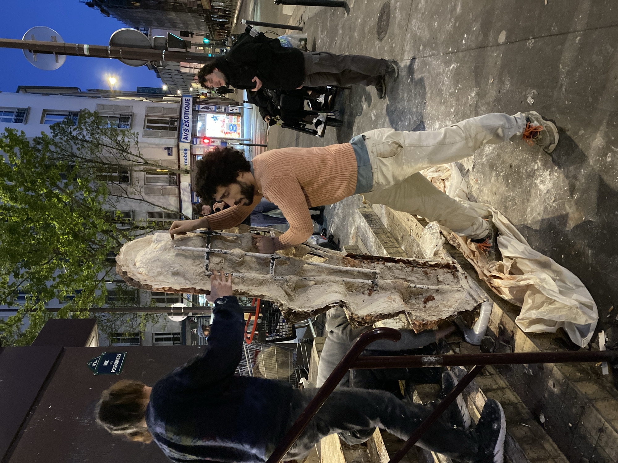 Artist builds tiered display outside Paris Franprix store
