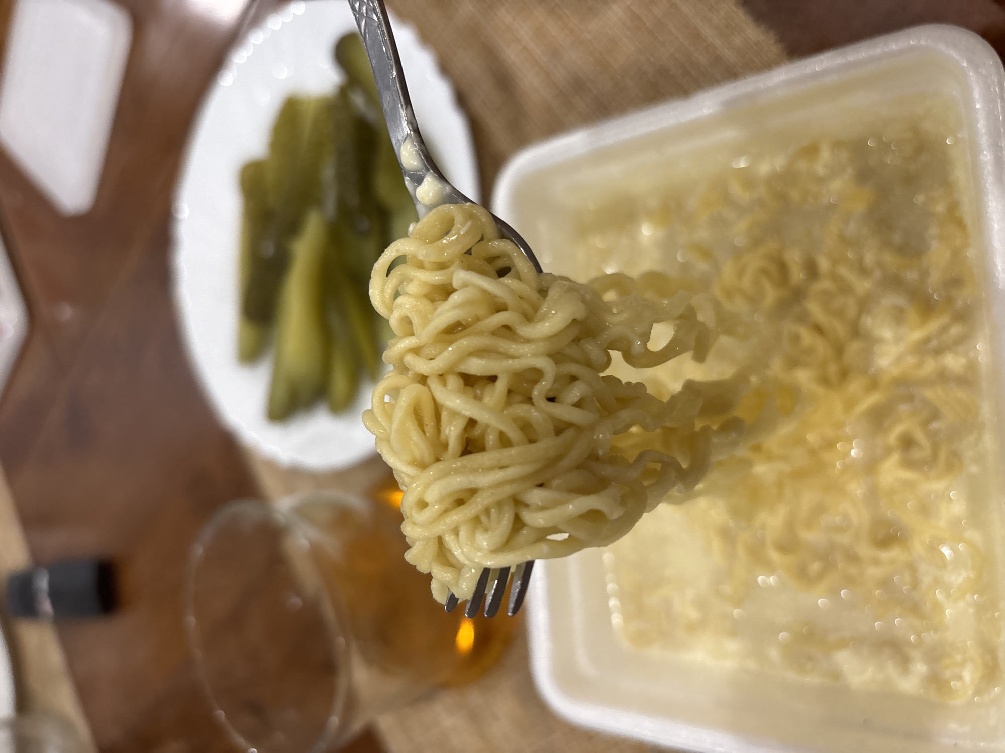 Ramen, pickles, and a drink at home in Sochi