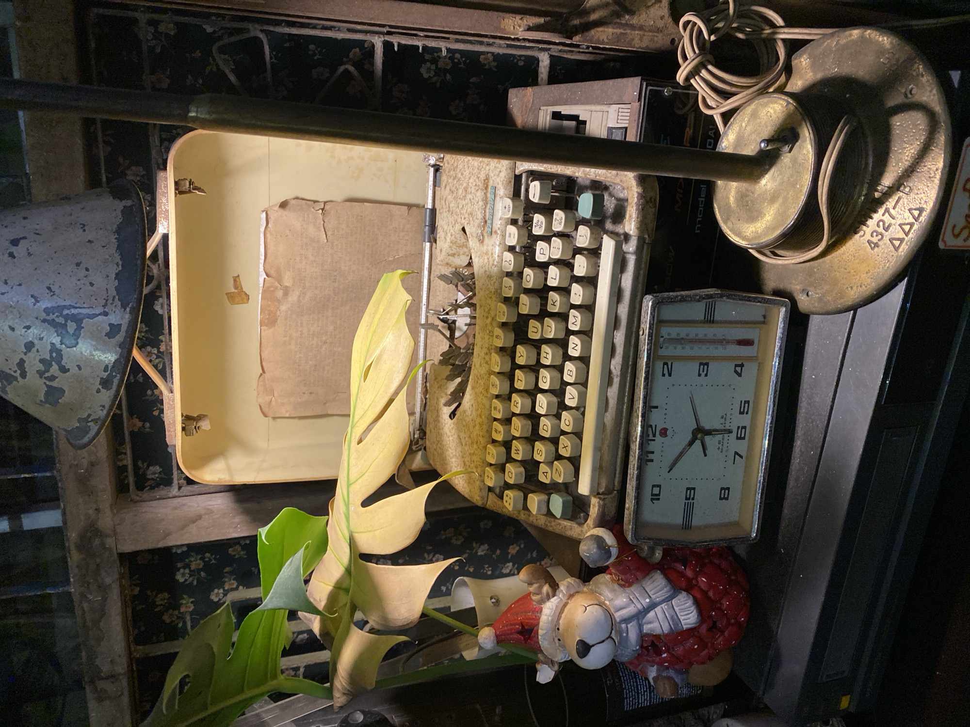Inside a cluttered vintage café in Đà Nẵng, Vietnam