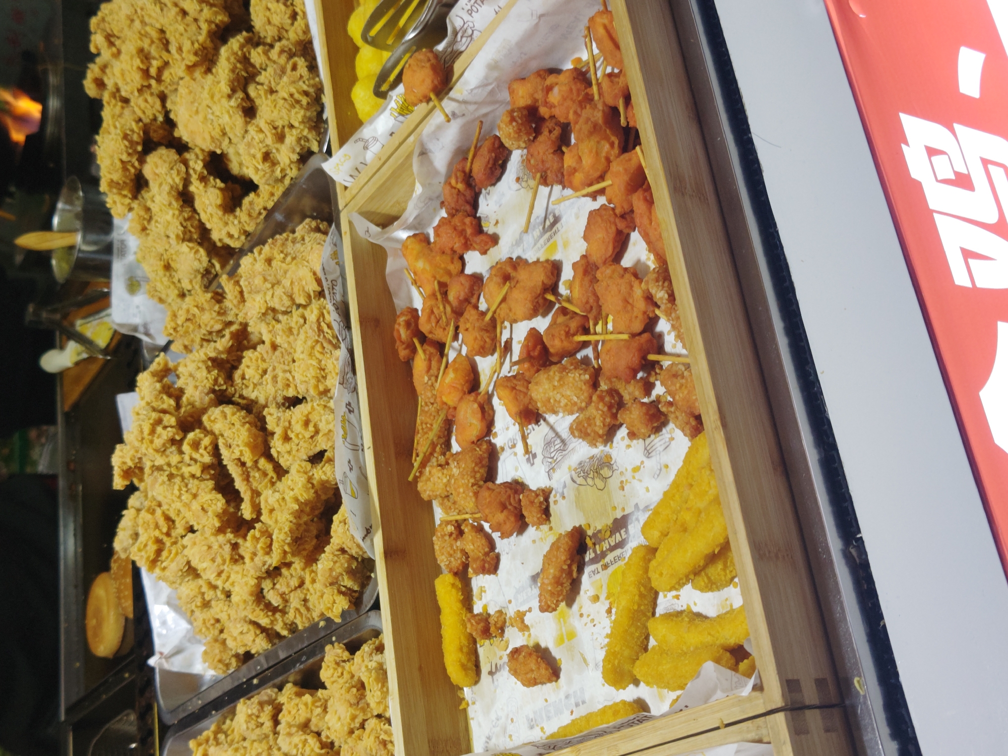Street food vendor serves fried chicken in Shapingba District