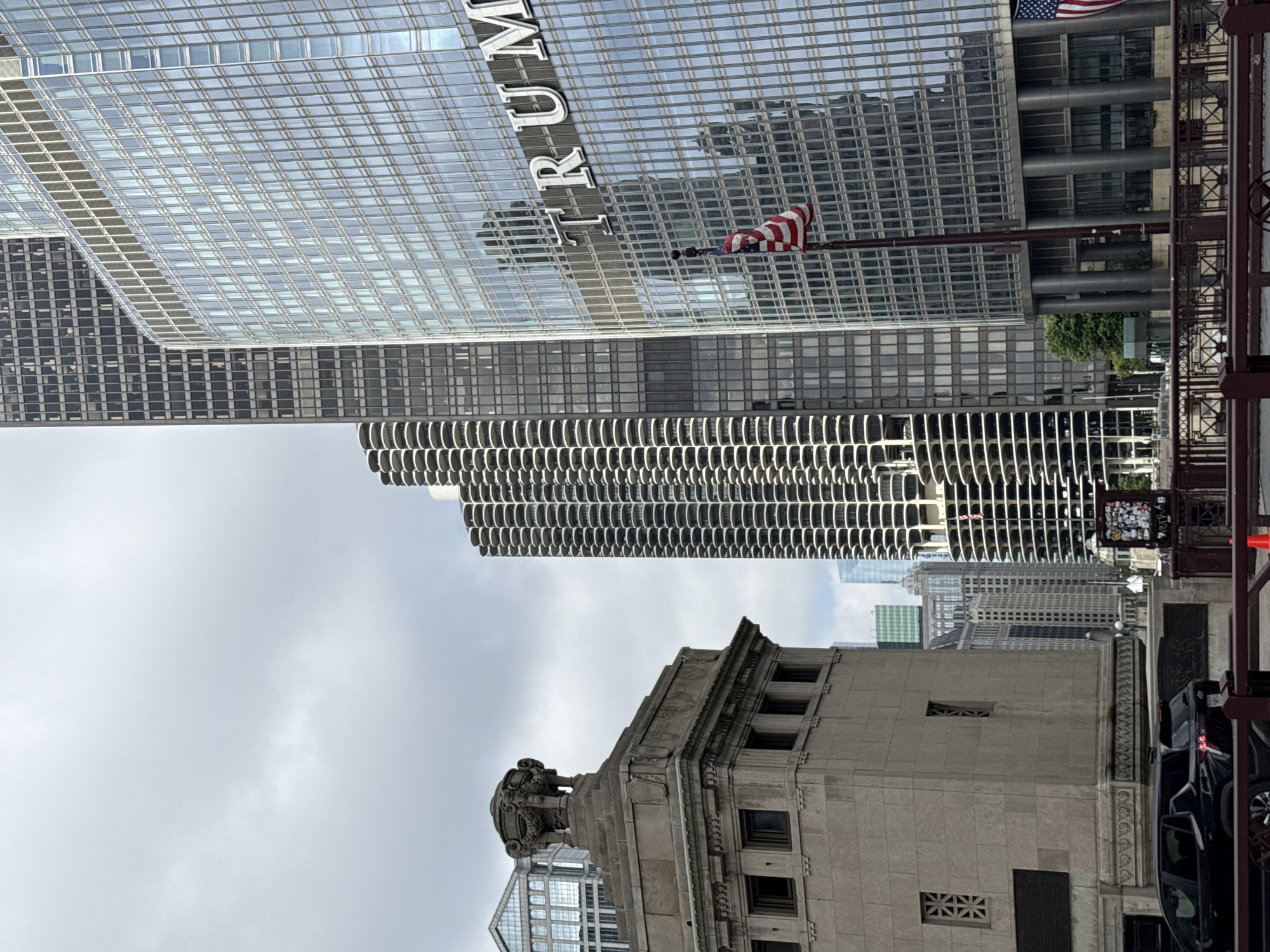 Street-level Chicago architecture and signage near the Wrigley Building