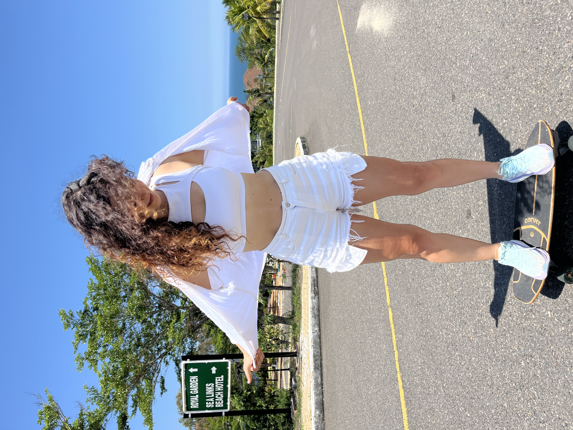 Skateboarding in all-white along the coastal roads of Phan Thiết
