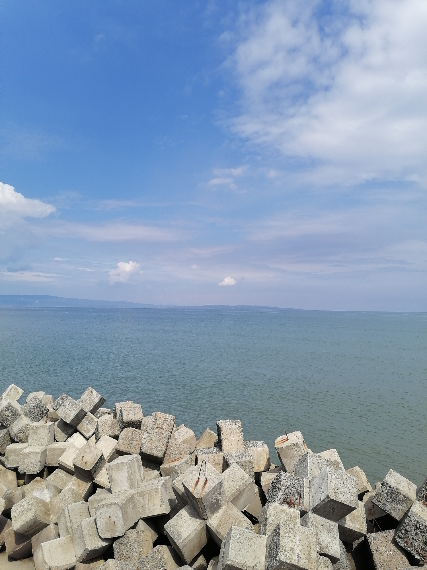 Morning at Davao City's tetrapod breakwater, fishing and selfies
