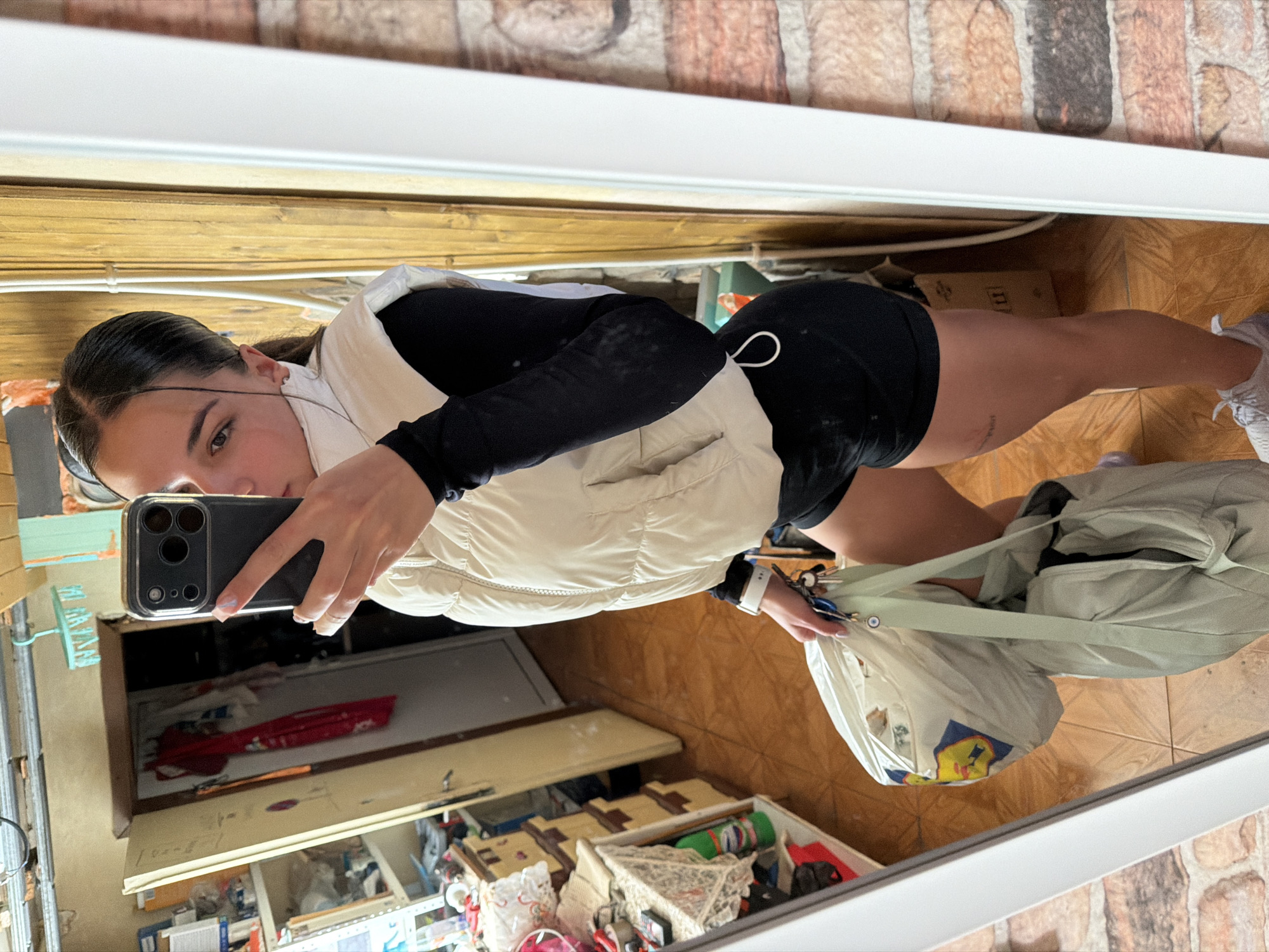 Woman takes mirror selfie in Balinovtsi, Bulgaria early morning