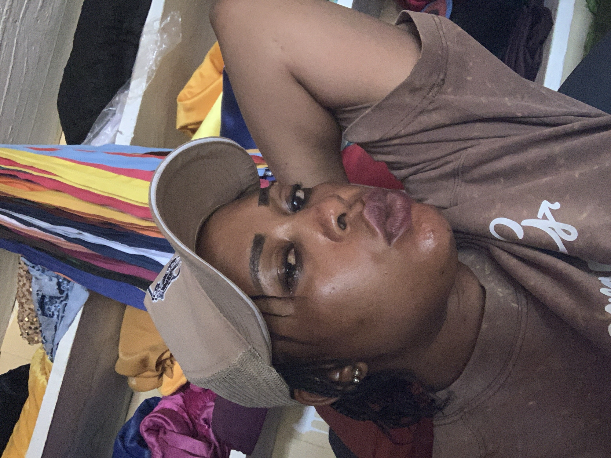 Casual indoor hangout near a small shop in Kaduna, Nigeria
