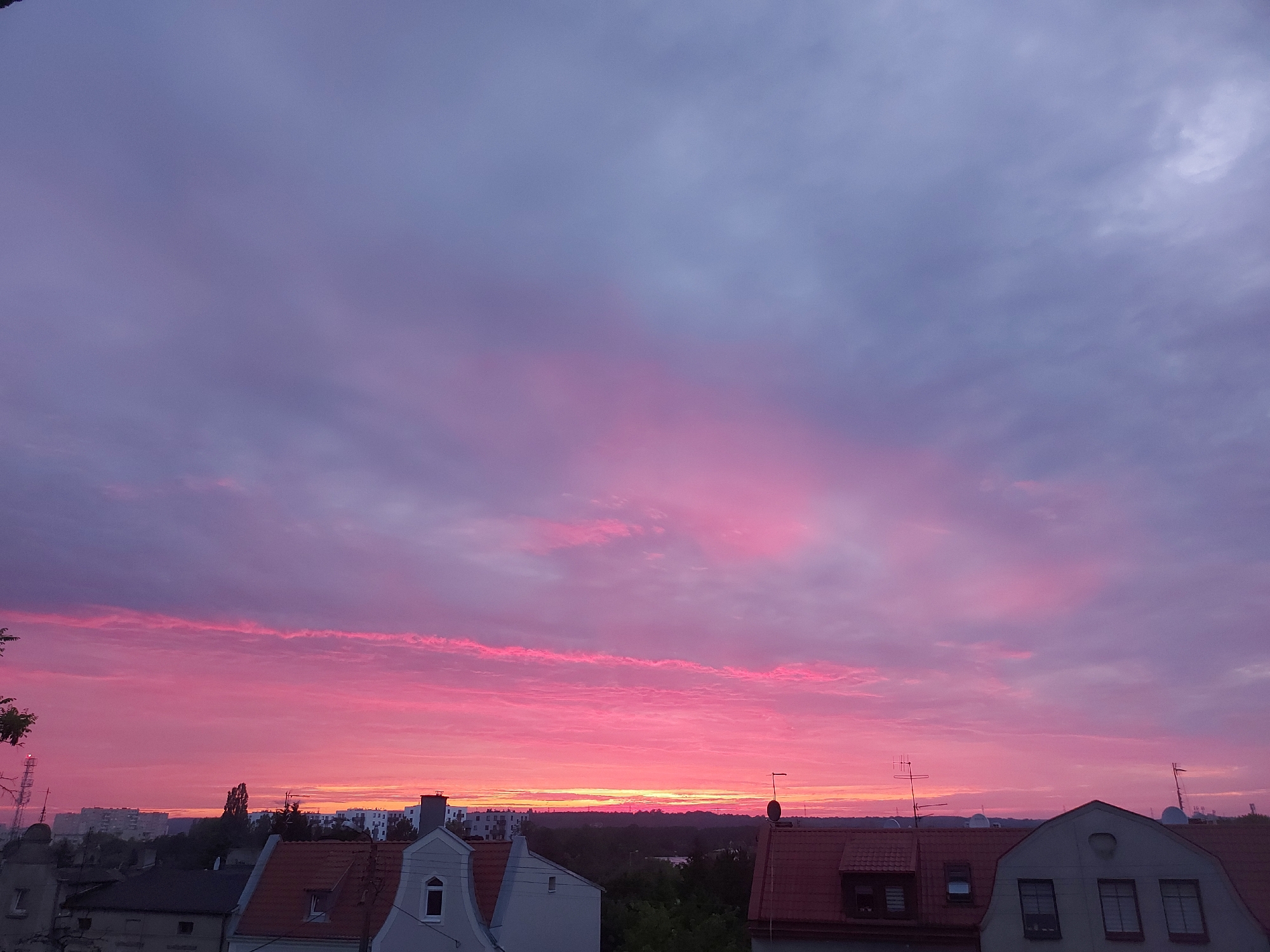 Summer solstice sunset fades over the Bydgoszcz skyline