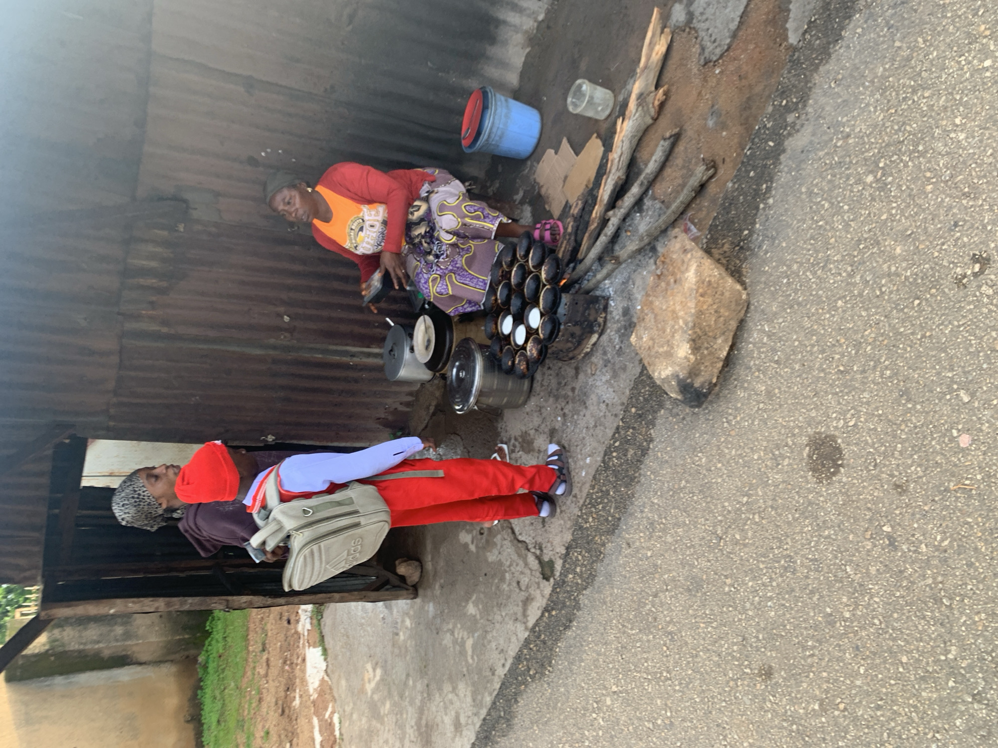 Everyday street life in Jos, Nigeria, captured in one moment