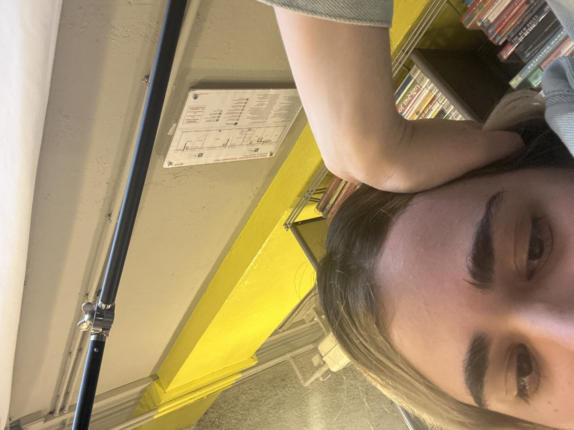 Person takes selfie in Milan bookstore
