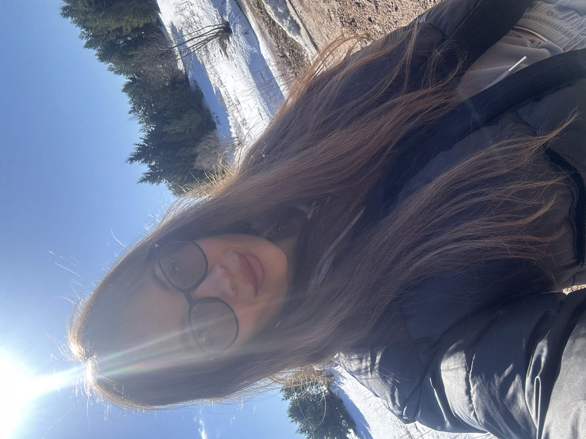 Woman captures winter selfie in snowy Перевозное, Russia