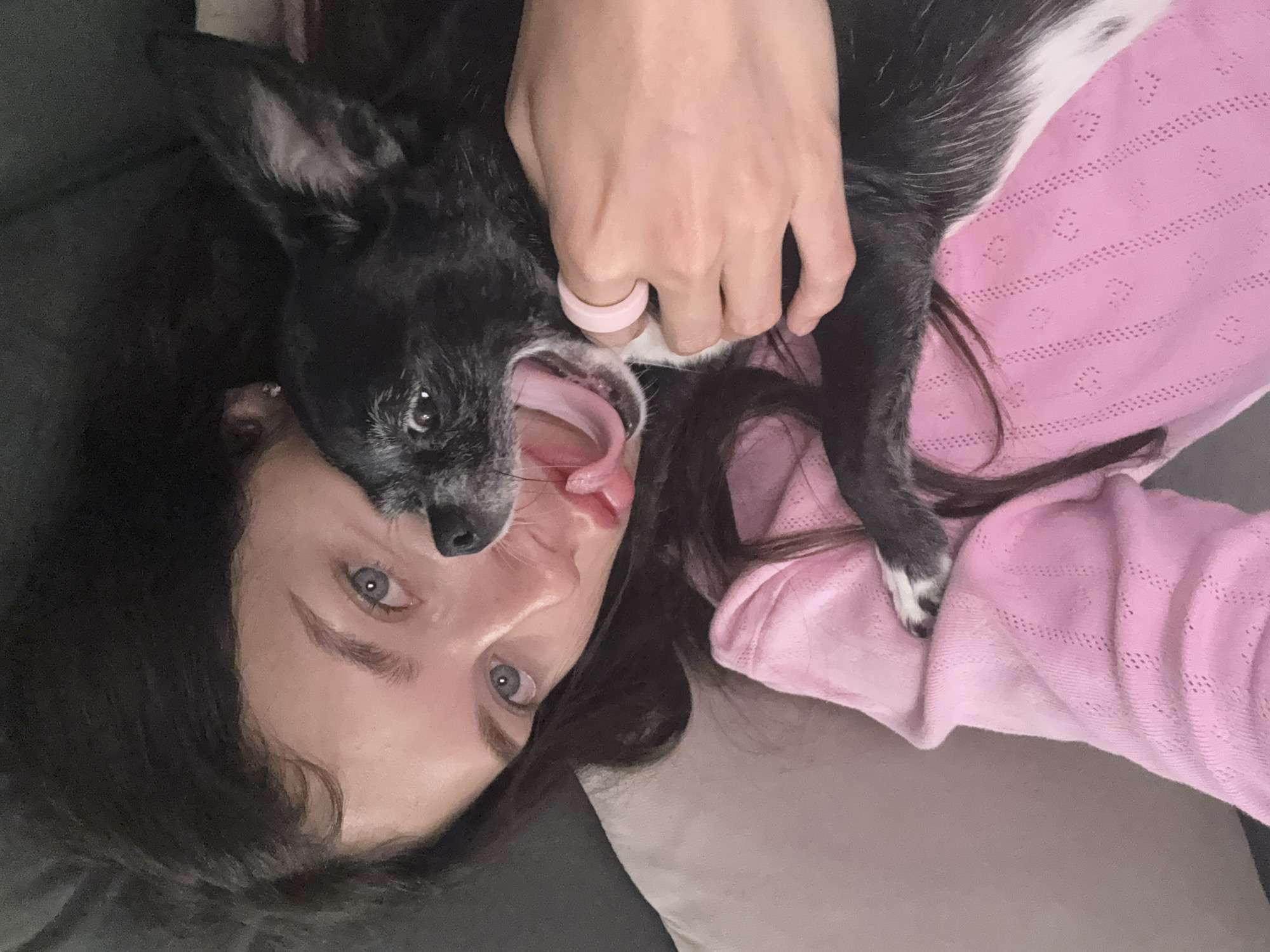 Couple and small dog documented in casual indoor moments