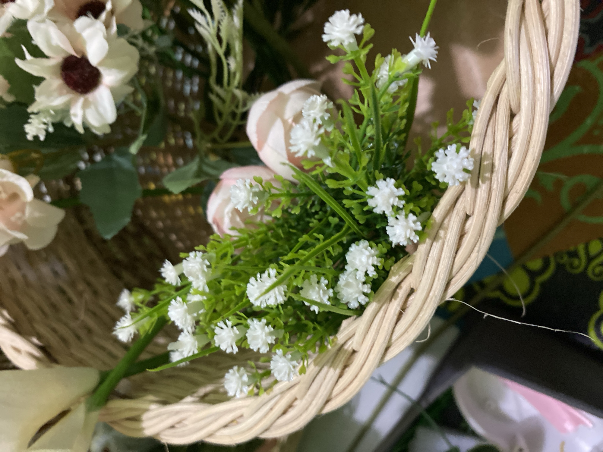 Artificial floral basket arrangements photographed up close in Kuala Pembuang