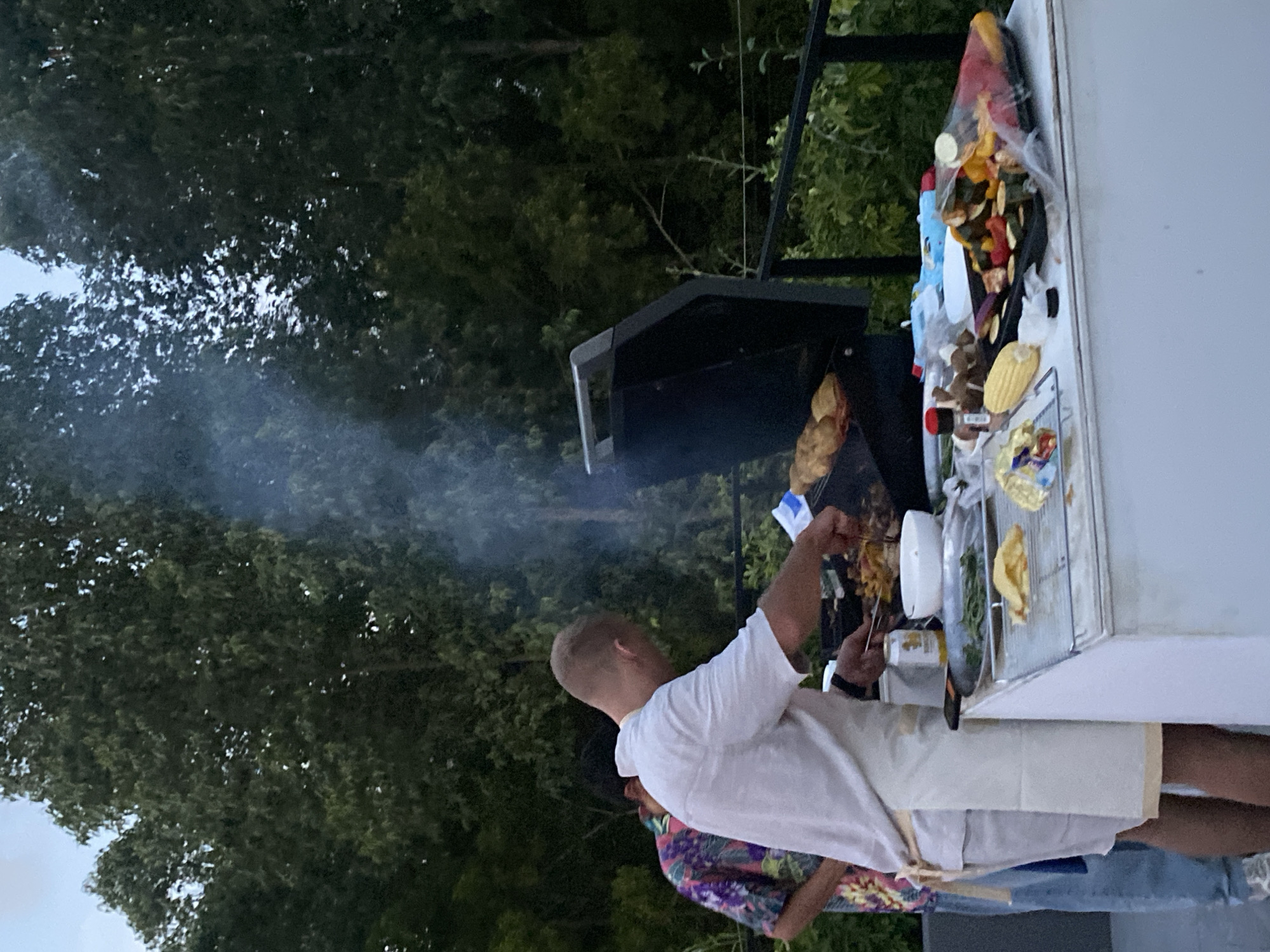 Outdoor barbecue gathering captured in Choeng Thale, Thailand