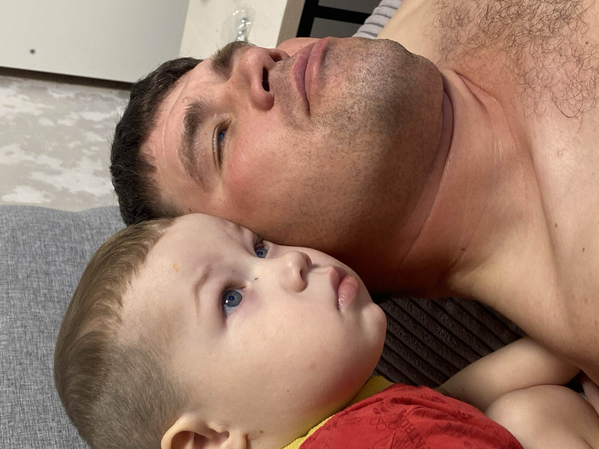 Father and child share quiet moments in Sochi home