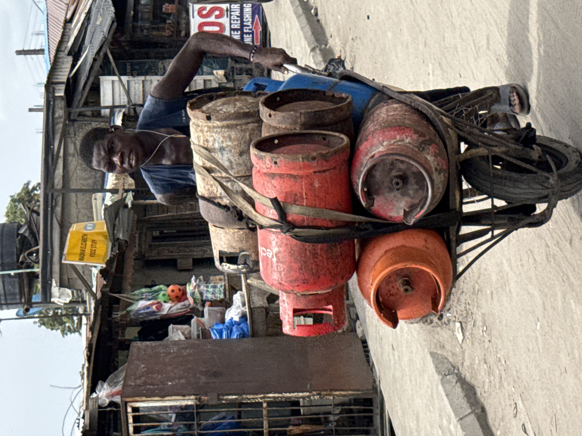 Lagos area residents spotted with gas transport bicycle, motorcycle