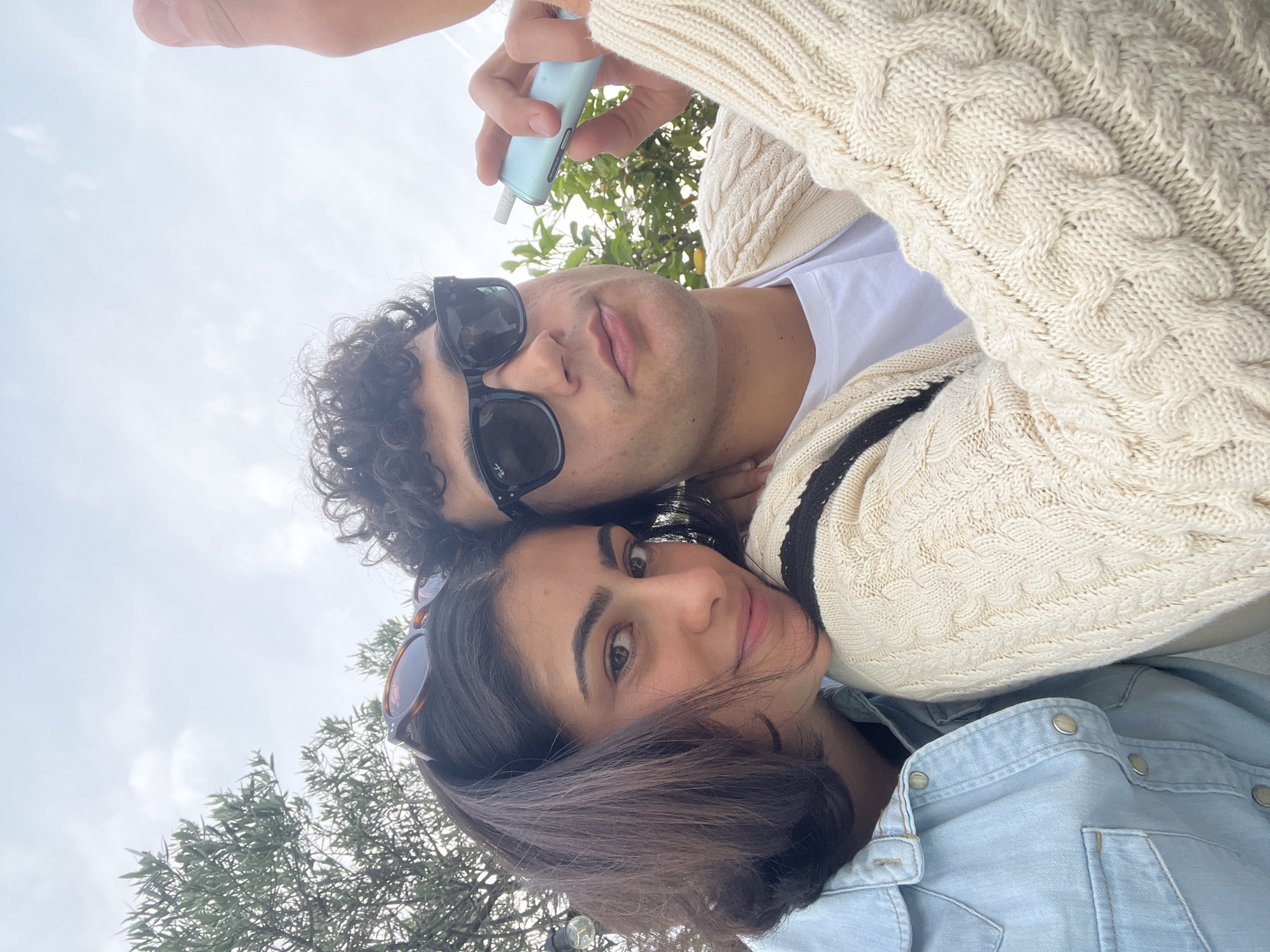 Young couple enjoys rooftop terrace time in Milan