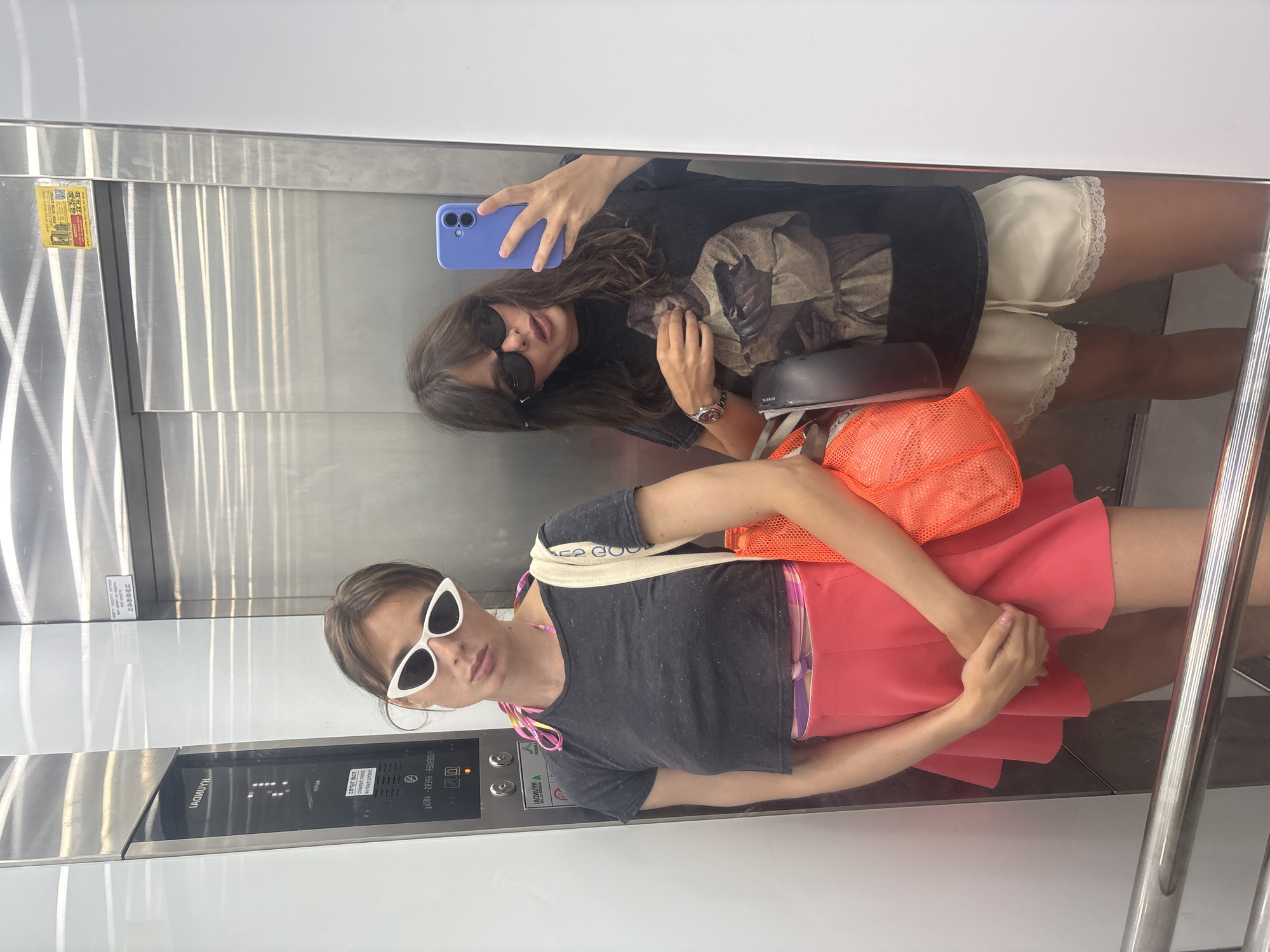 Mirror selfies in Tel Aviv elevators and hallways