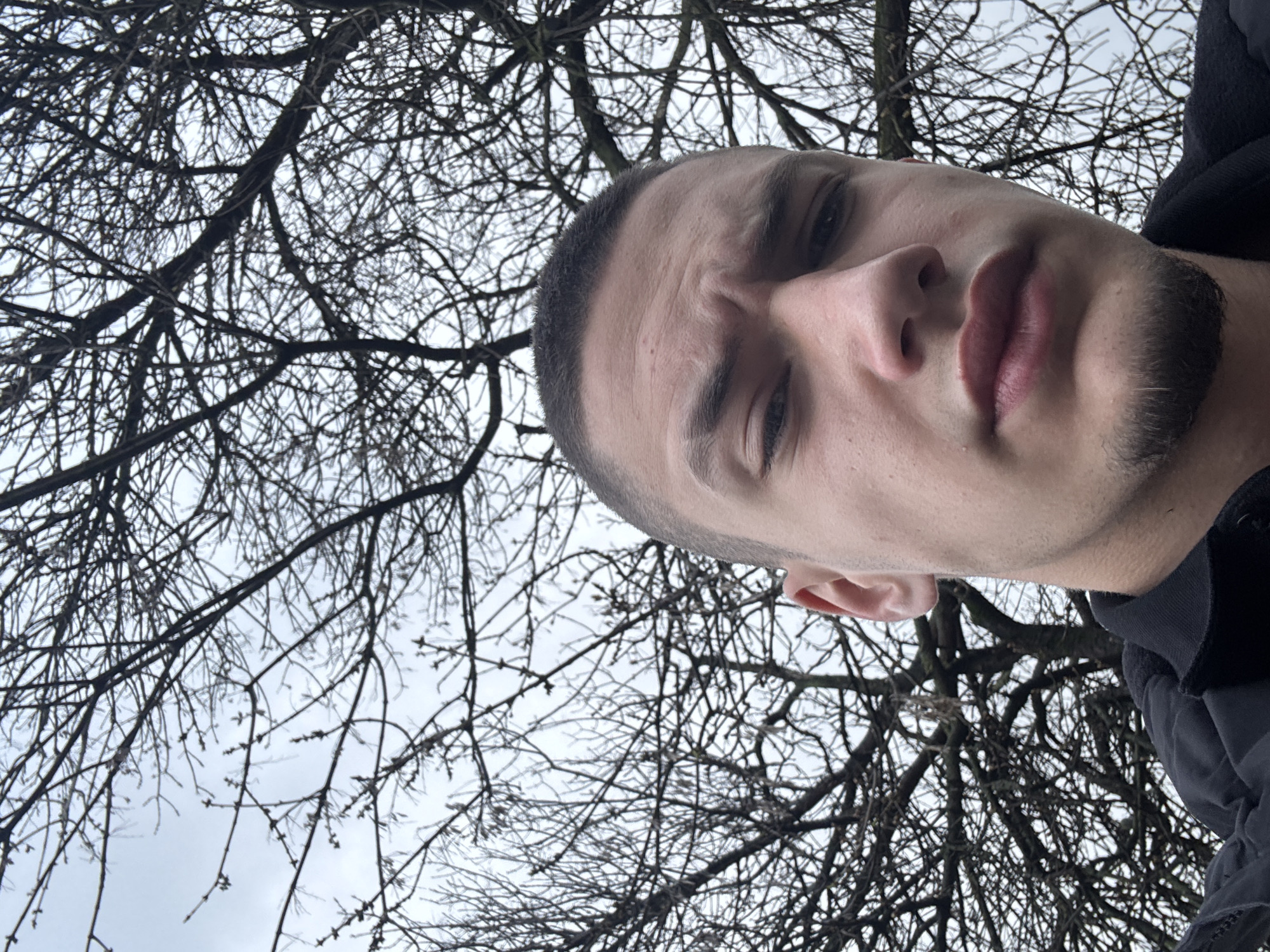 Man takes morning selfie under overcast sky in Shumen