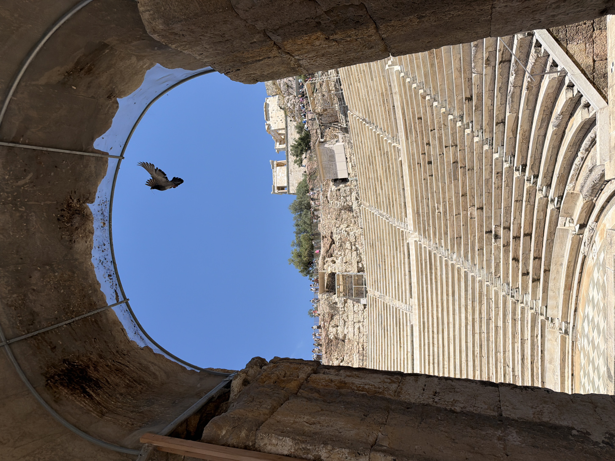 Tourist takes playful selfie at ancient Athens archaeological site
