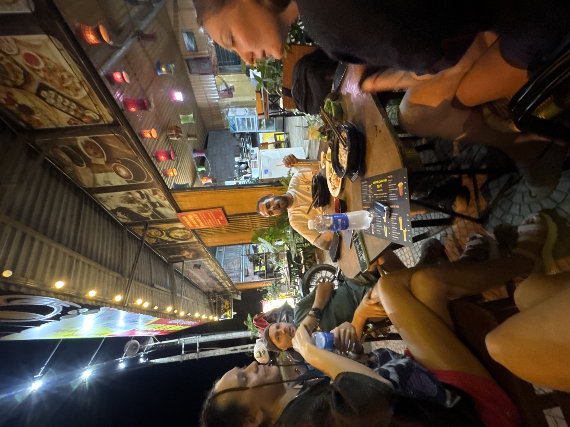 Evening dining gathering captured in Mù Cang Chải, Vietnam