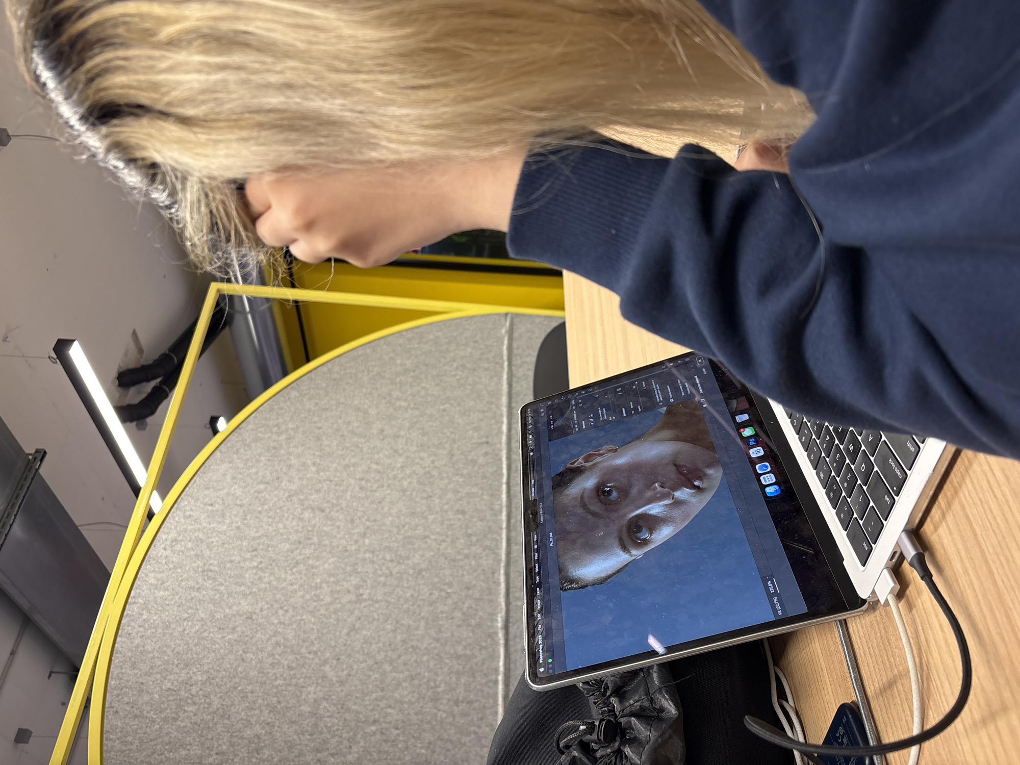 Photo editing session captured at Novate Milanese office workspace
