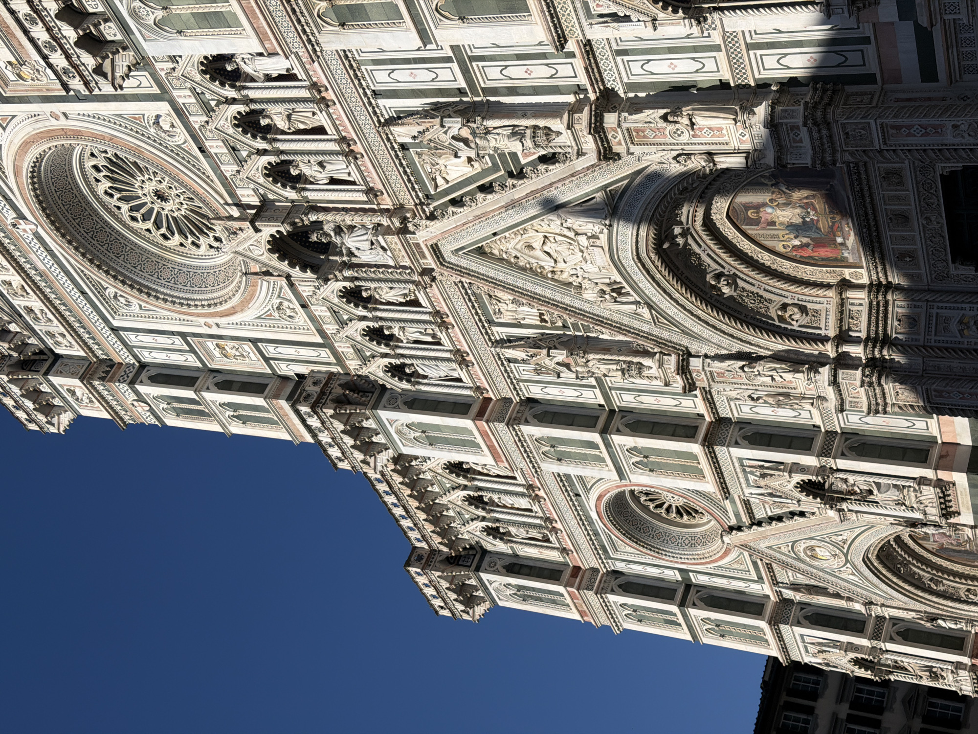 Tourist documents Florence Cathedral complex from multiple angles