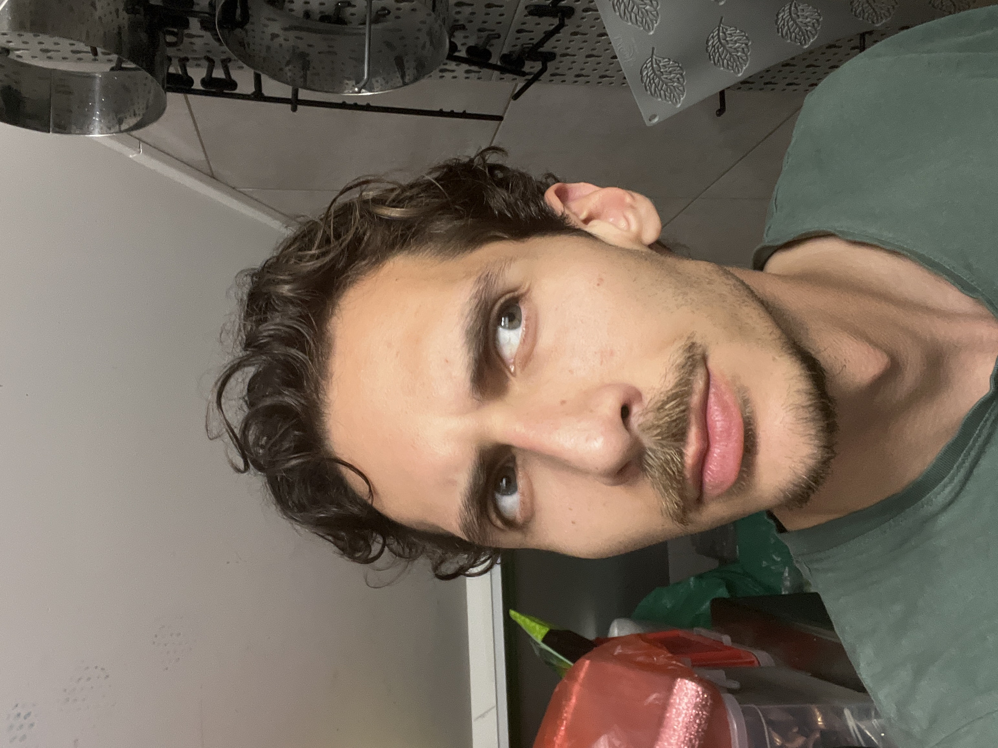 Man photographed in kitchen setting in Budva, Montenegro