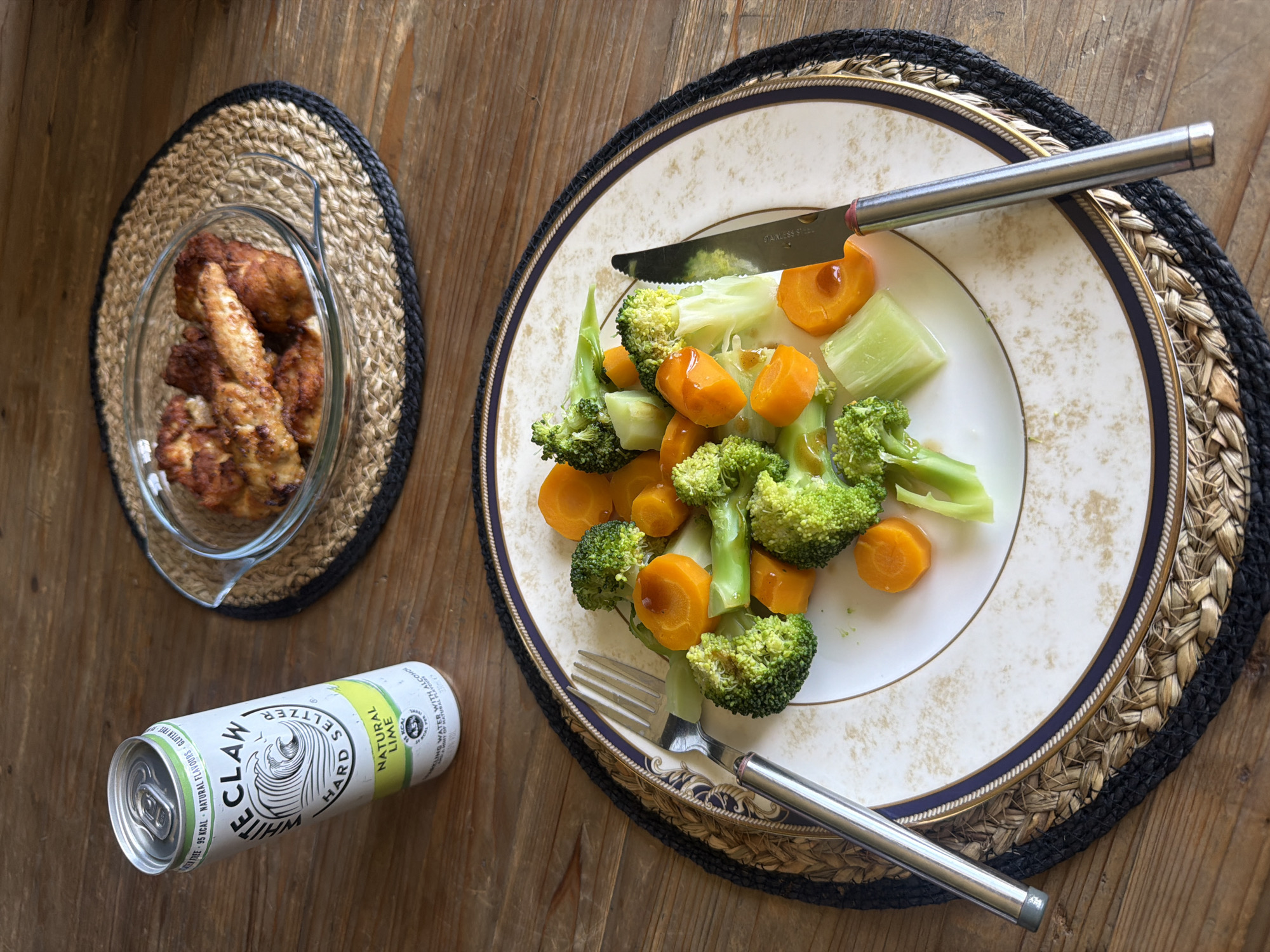 Dinner with steamed vegetables and White Claw seltzer